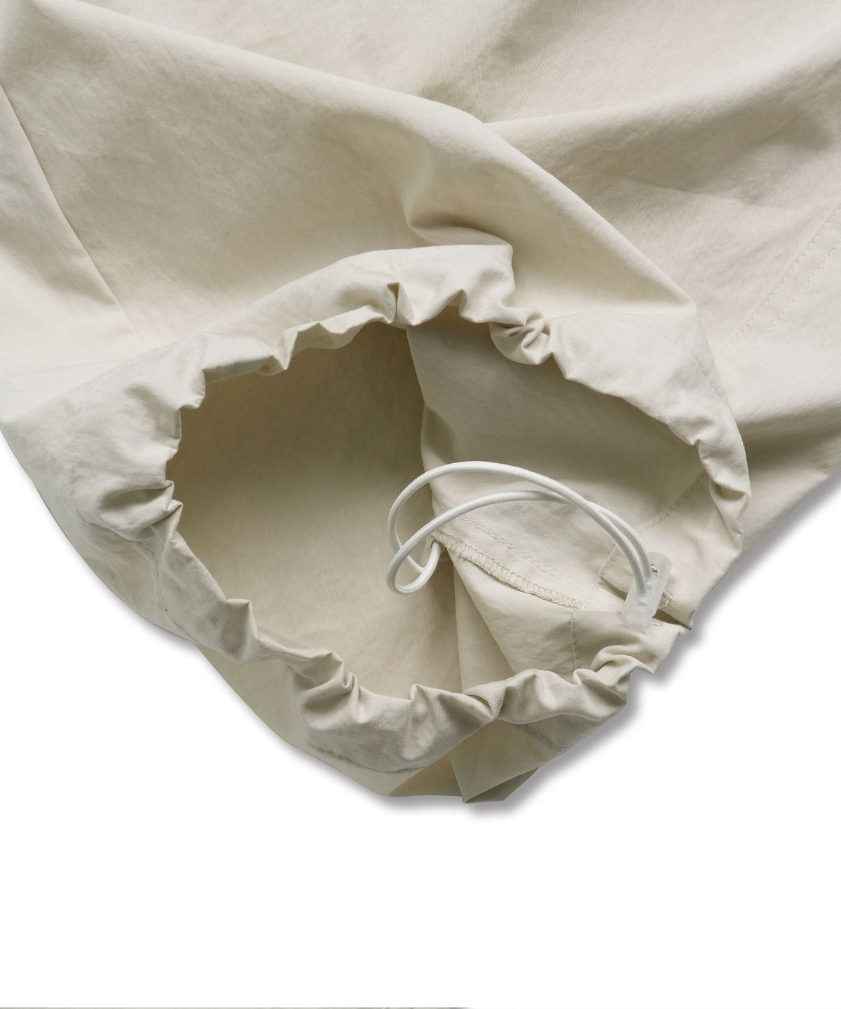 도프셉(DOFFSEPT) Frill Edge Nylon Pants in Beige