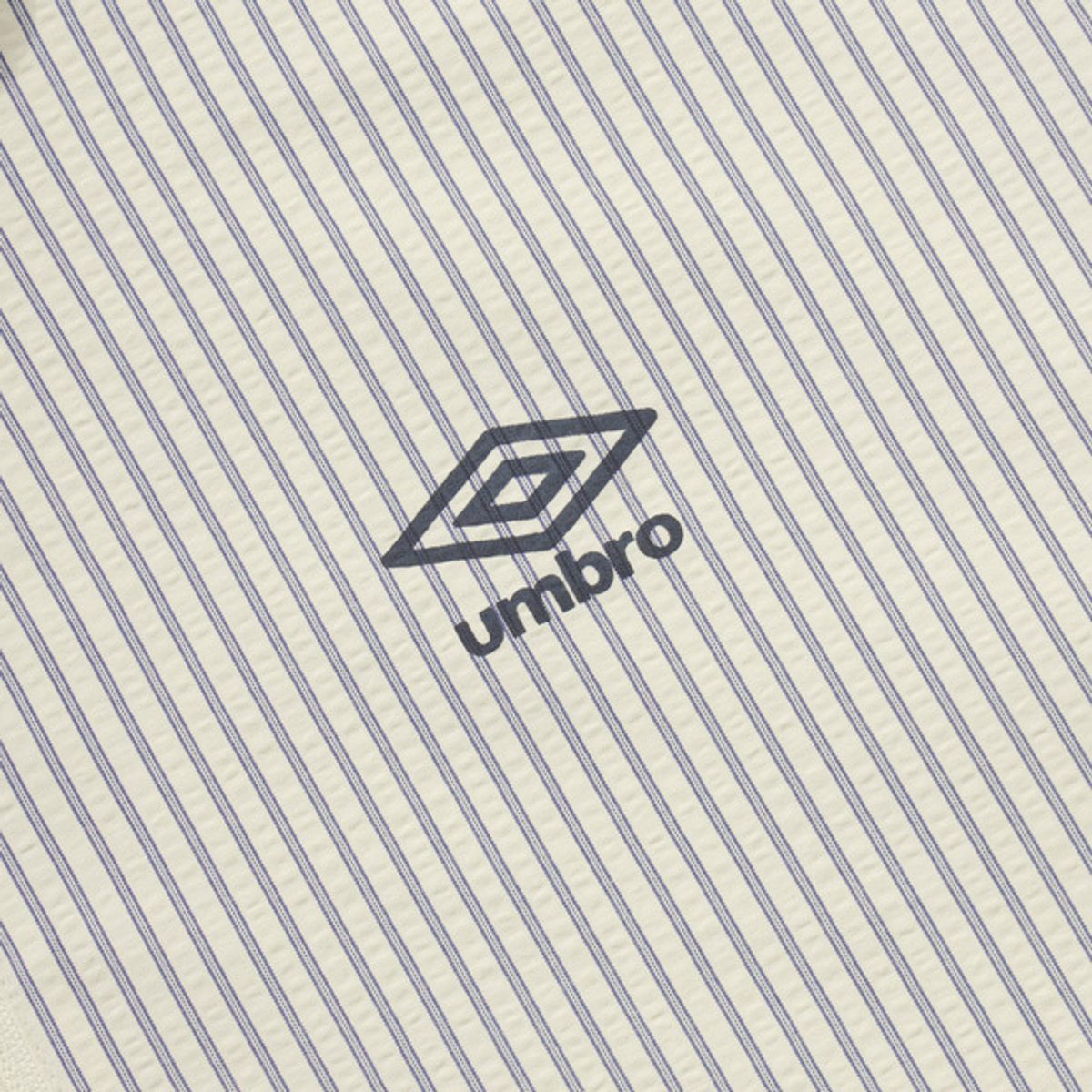 엄브로(UMBRO) 시어서커 반팔 스탠넥 아노락 화이트(UQ221CWT63)