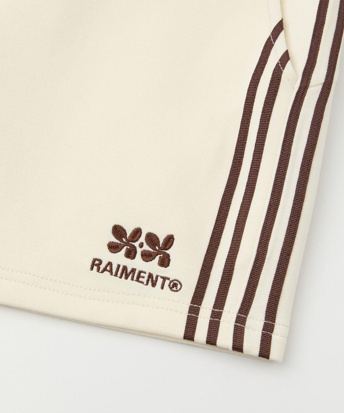 레이몬트(RAIMENT) (W) 우먼즈 트랙 라인 밴딩 하프 쇼츠_크림