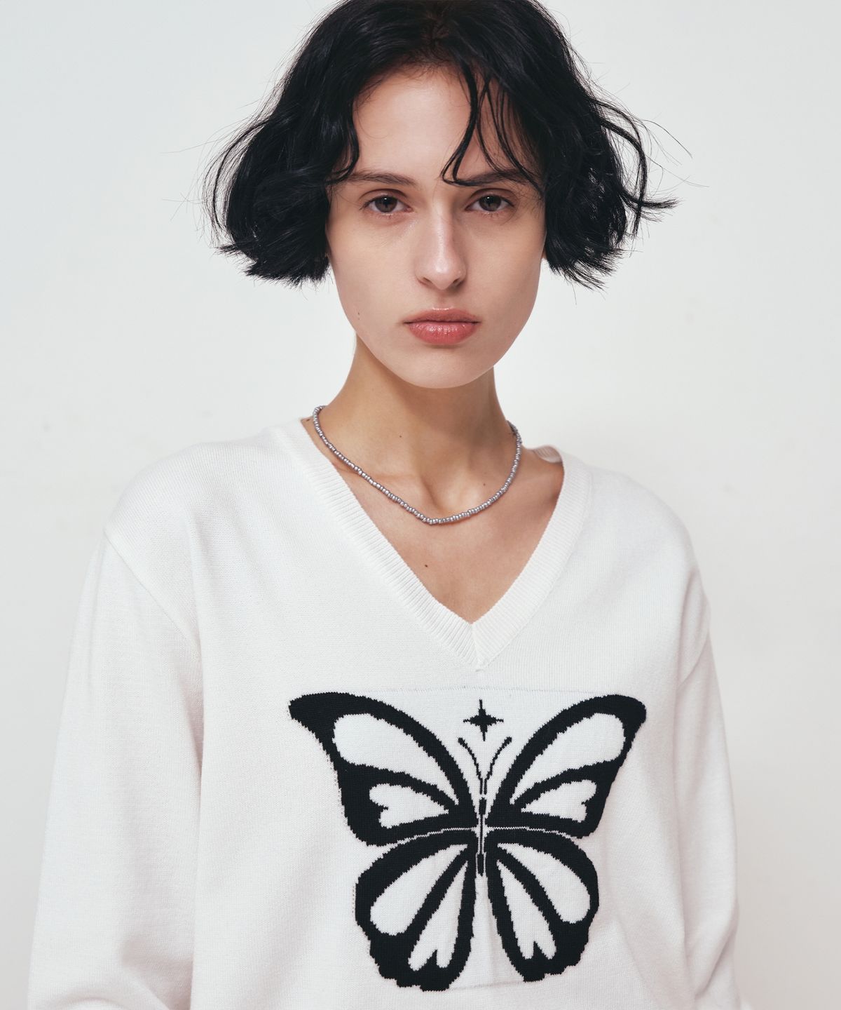 닉앤니콜(NICK&NICOLE) BUTTERFLY V NECK JACQUARD KNIT_IVORY
