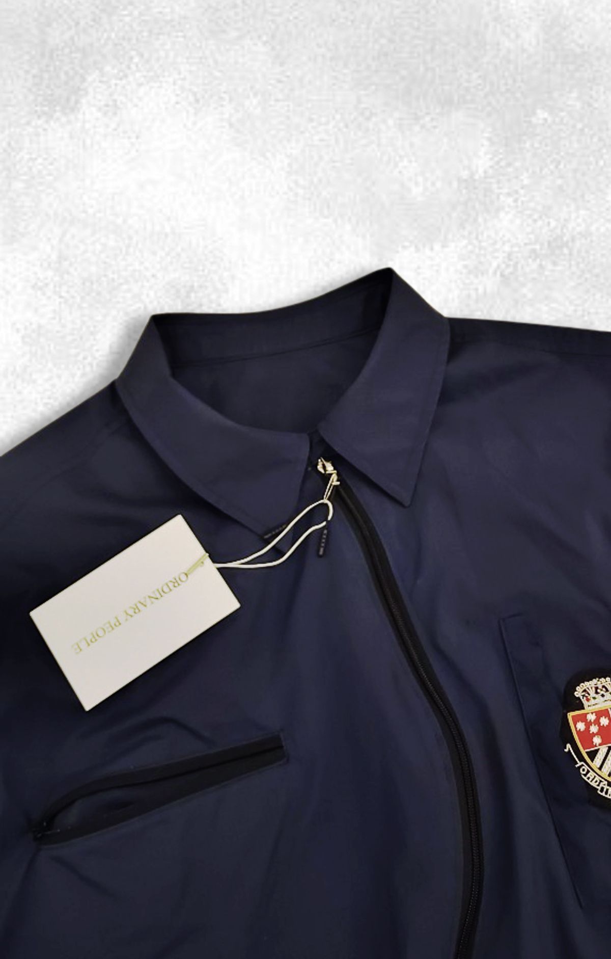 오디너리피플(ORDINARY PEOPLE) RE : Sloping Zip Wave Jacket [Navy]