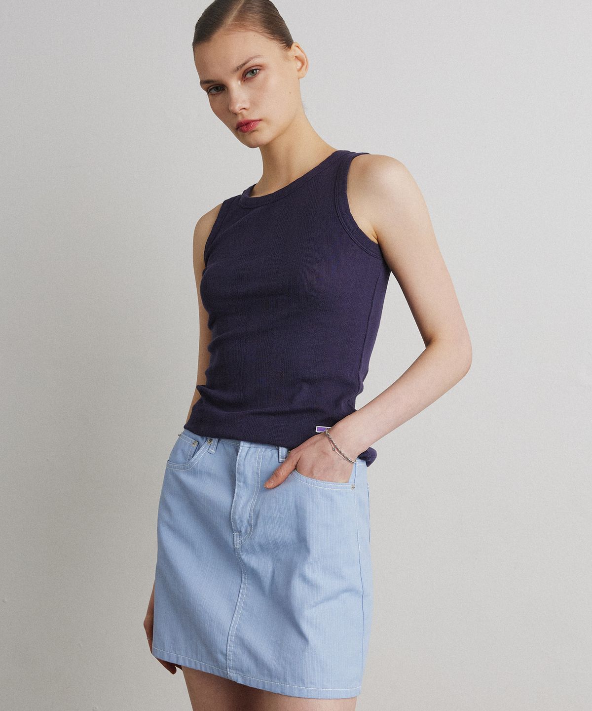 아흐레(AHRE) RIBBED DENIM MINI SKIRT_Light blue