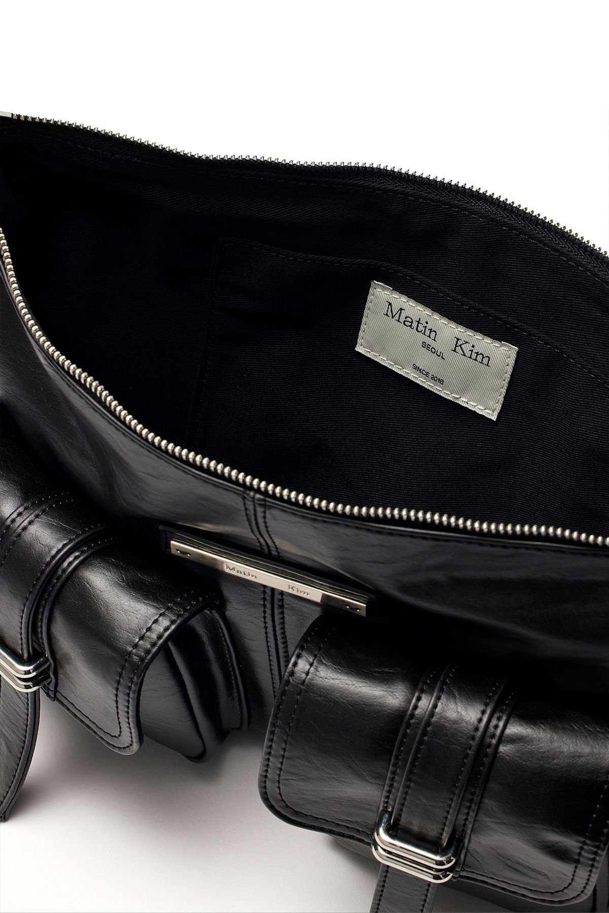 MUSINSA | MATIN KIM DOUBLE POCKET SHOULDER BAG IN BLACK