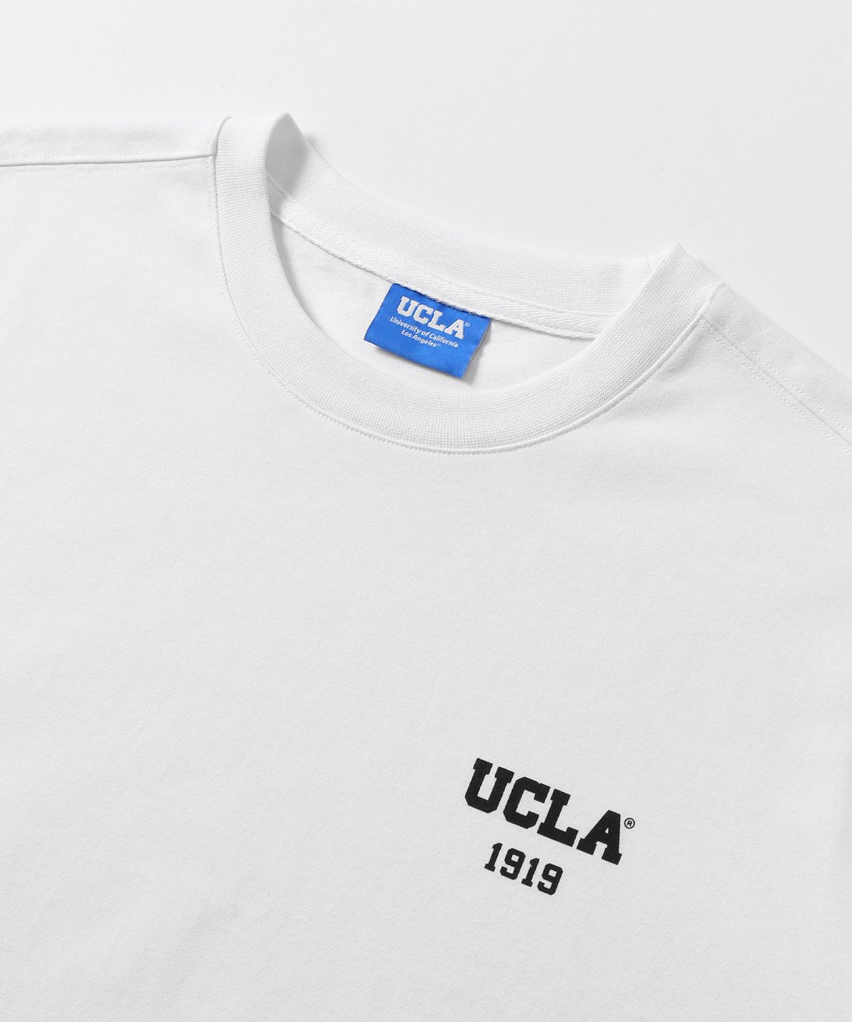 유씨엘에이(UCLA) 남성 스몰로고 레귤러핏 반팔 티셔츠[O-WHITE](UB5ST90)