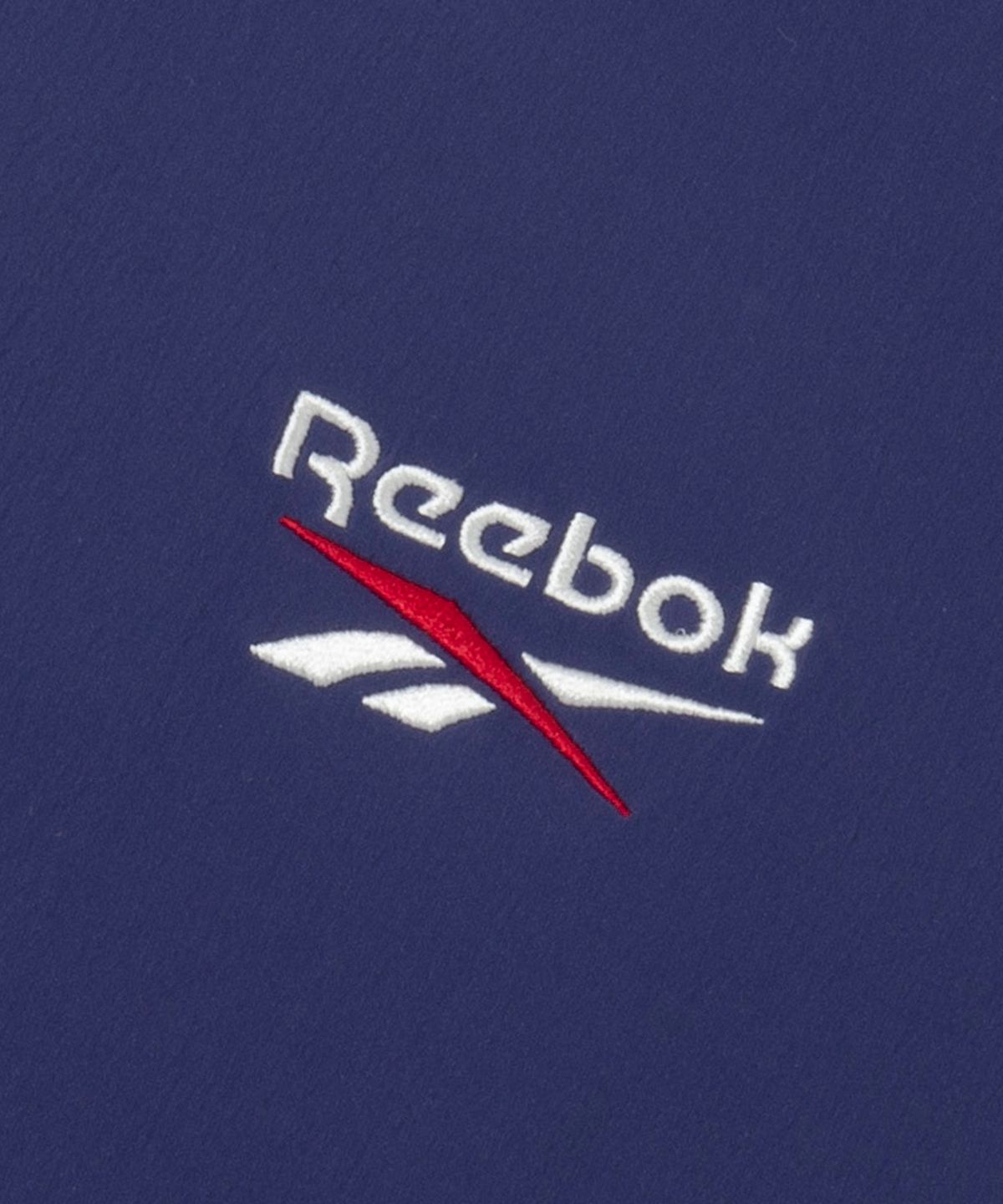 리복(REEBOK) 아이스 우븐 반팔 피스테 - 네이비