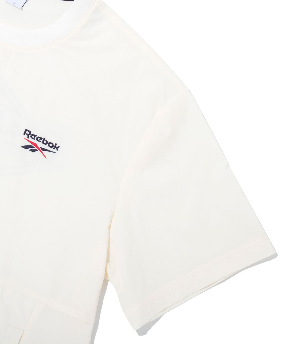 리복(REEBOK) 아이스 우븐 반팔 피스테 - 화이트