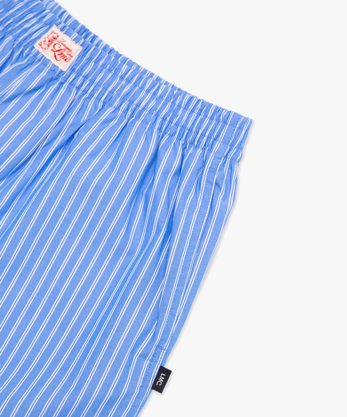 엘엠씨(LMC) STRIPE RESORT SHORT PANTS blue