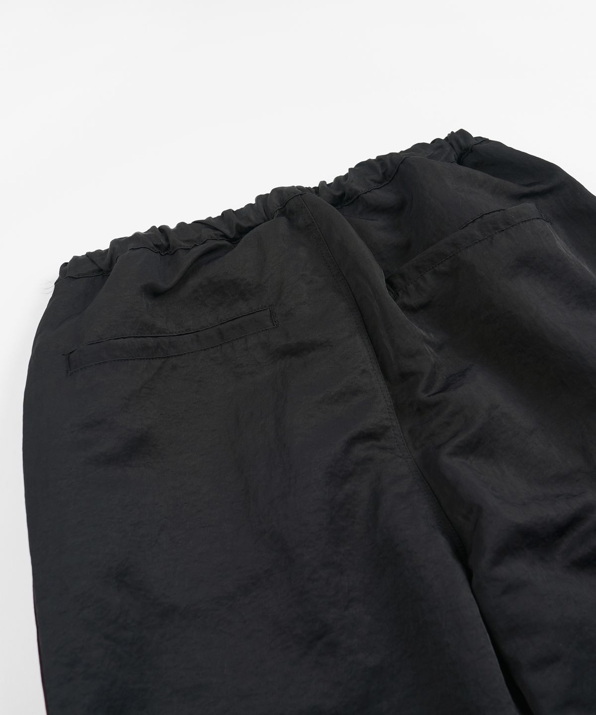 프리즘웍스(FRIZMWORKS) STRING NYLON TRACK PANTS _ BLACK