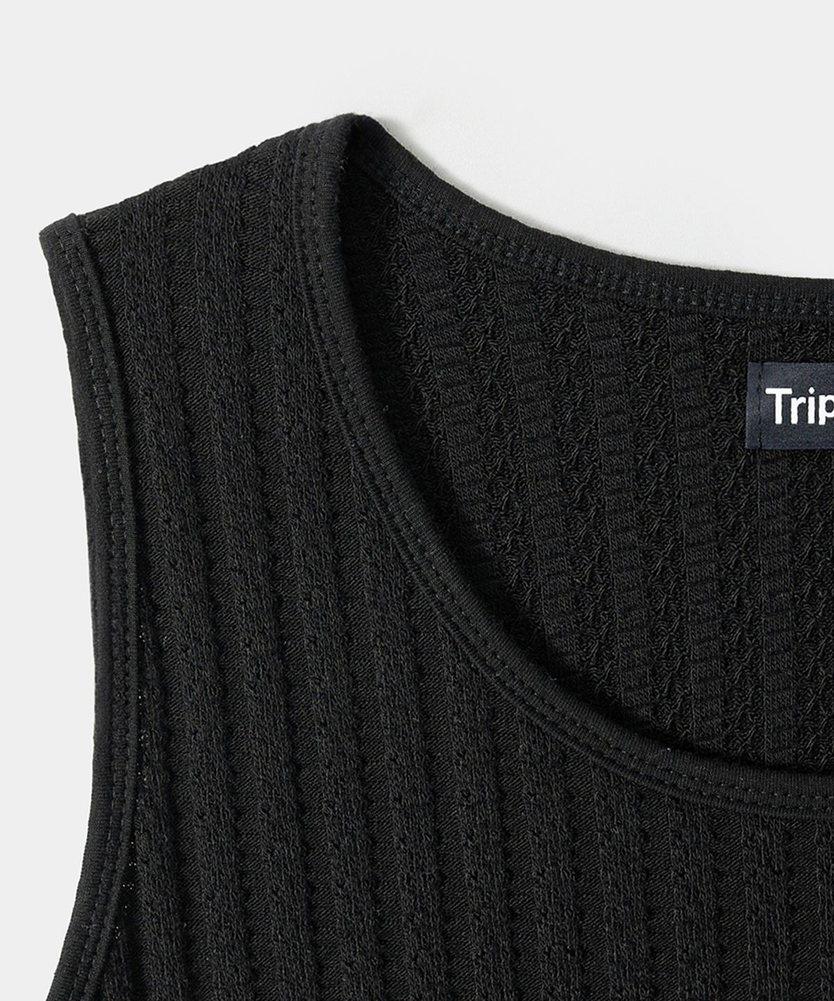 트립르센스(TRIP LE SENS) 웨이븐 로고 플레이트 슬리브리스_아이보리