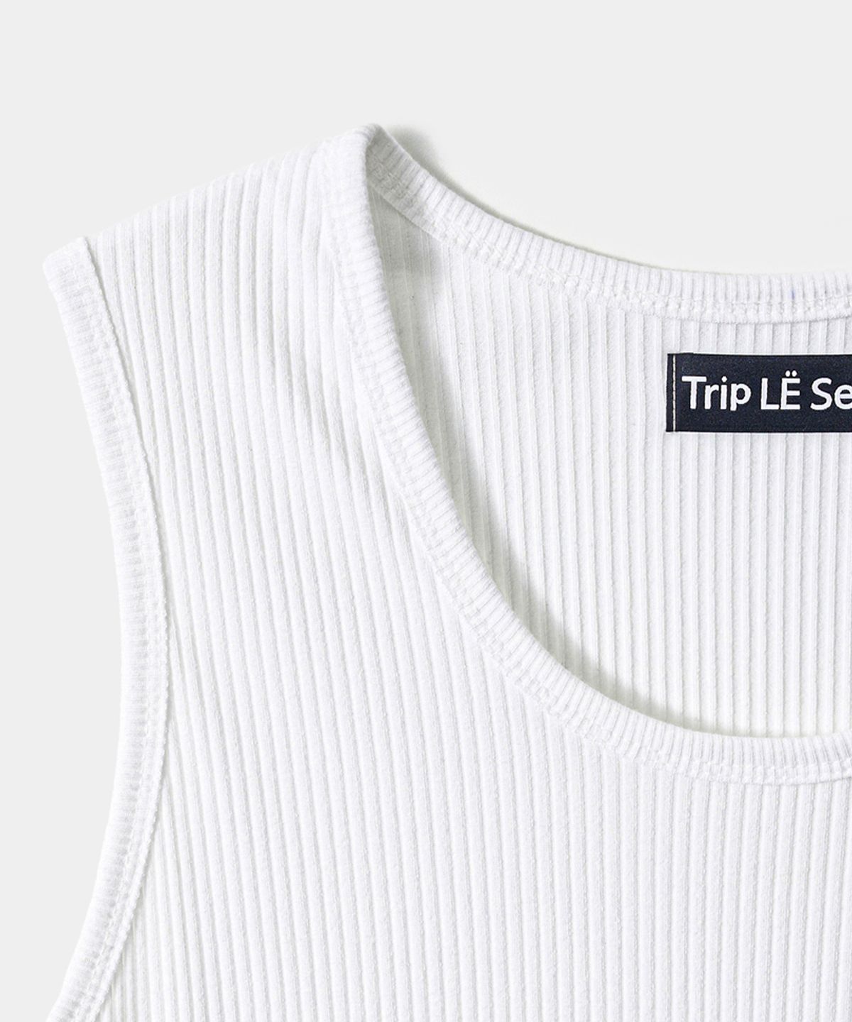 트립르센스(TRIP LE SENS) 로고 플레이트 모달코튼 슬리브리스_화이트