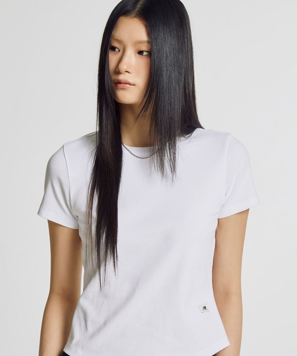뉴발란스(NEW BALANCE) NBNEG3W432 / WOMEN 에센셜 핏티드 반팔티 (WHITE)