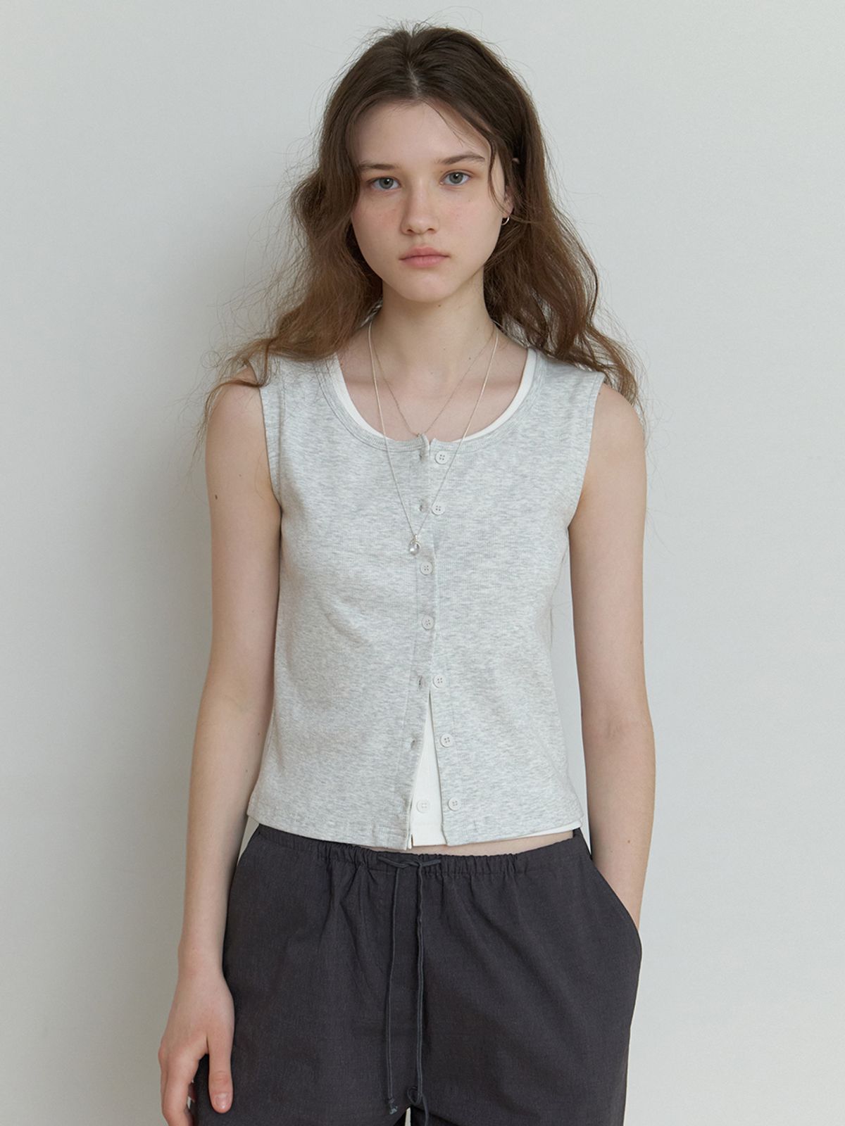 더미튼(THEMITTEN) Nap button sleeveless (melange gray)