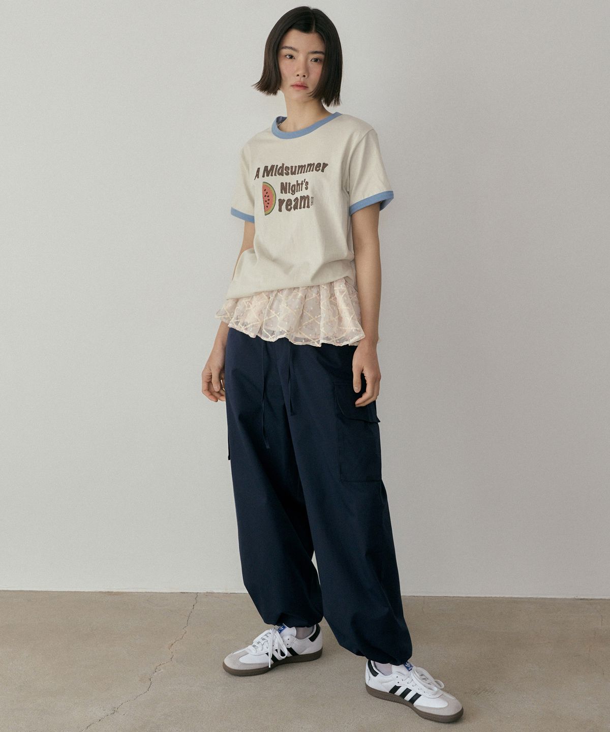 리올그(REORG) ASP LAYERED FLOWER MINI SKIRT BUTTER CREAM