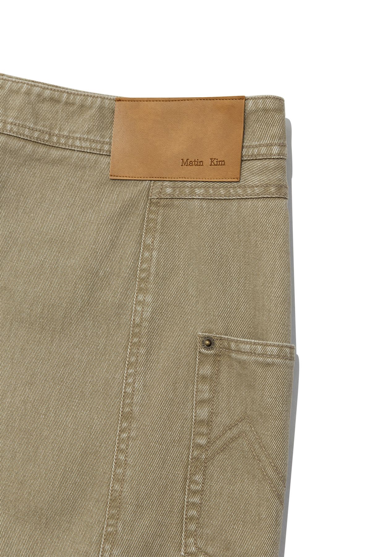 MUSINSA公式 | MATIN KIM SIDE POCKET POINT MIDI SKIRT IN