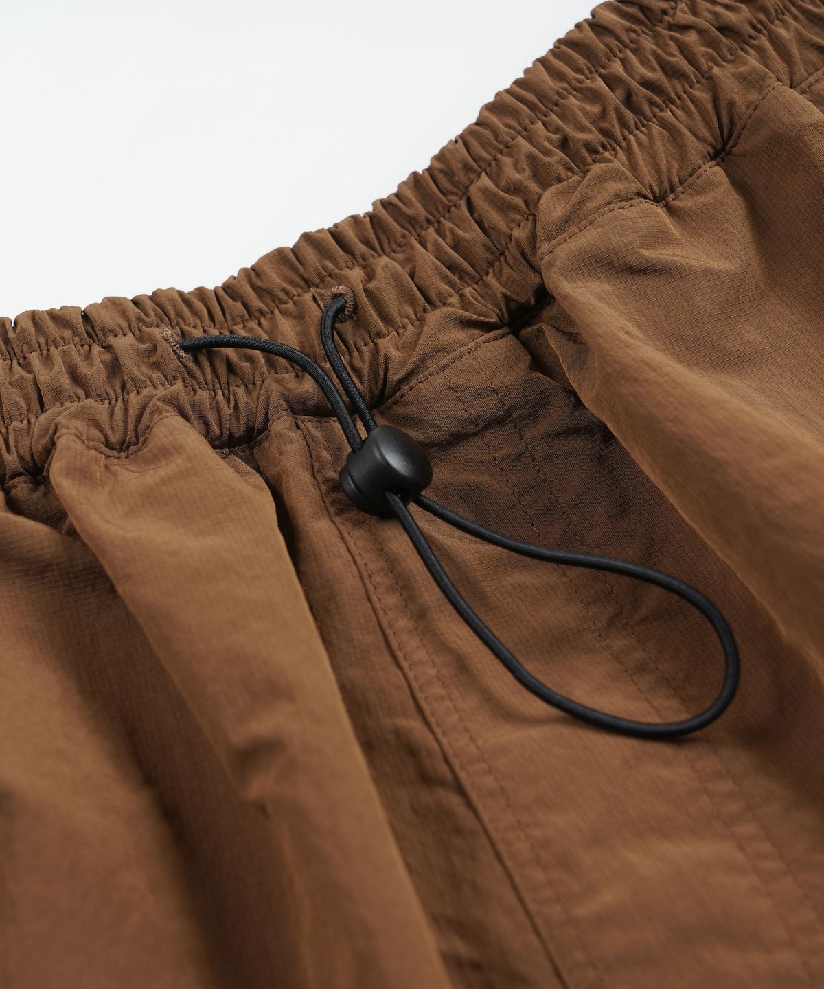 프리즘웍스(FRIZMWORKS) NYLON UTILITY POCKET SHORTS _ BROWN