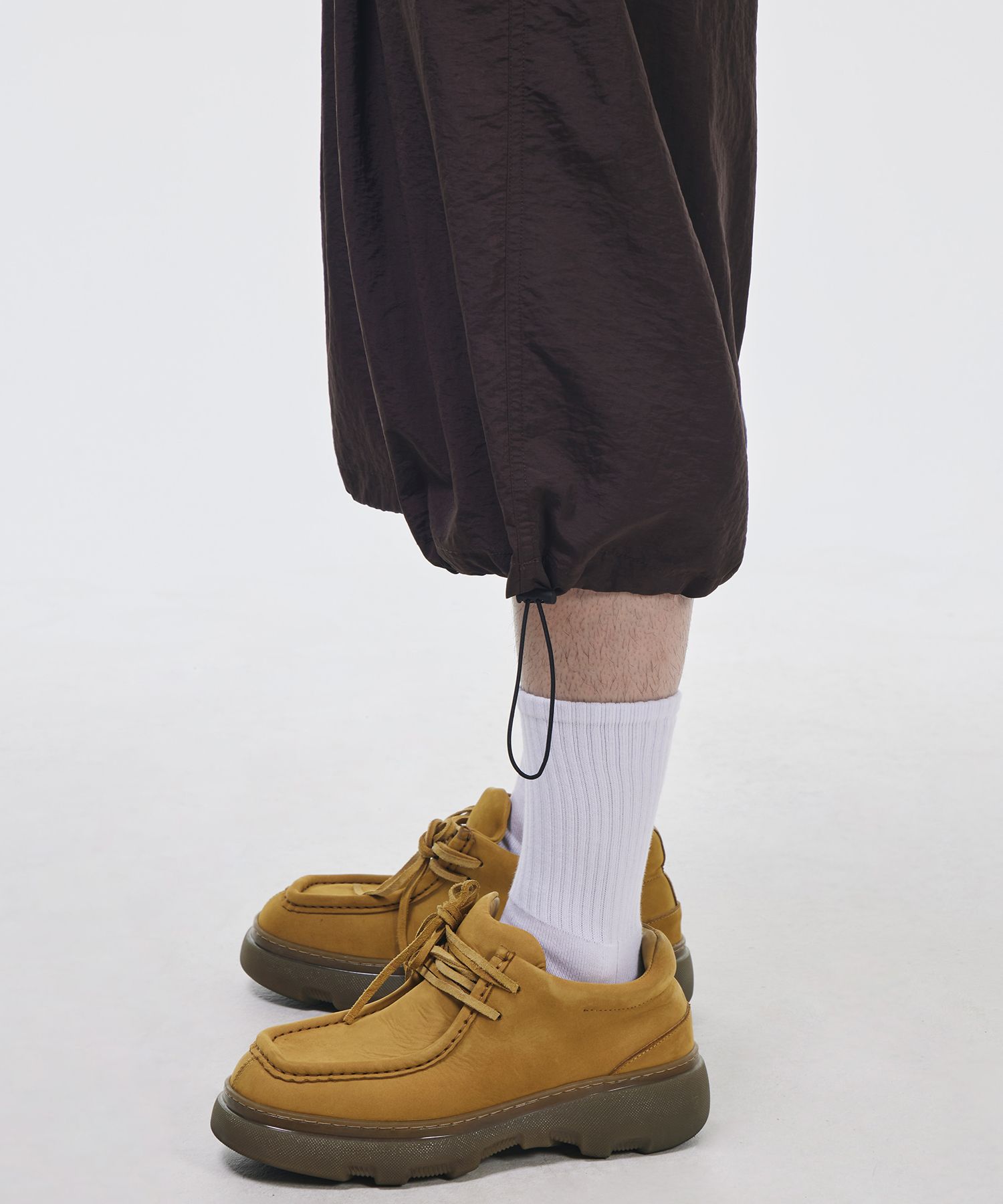 MUSINSA公式 | SIGNATURE One-Tuck Banding Nylon Bermuda Pants