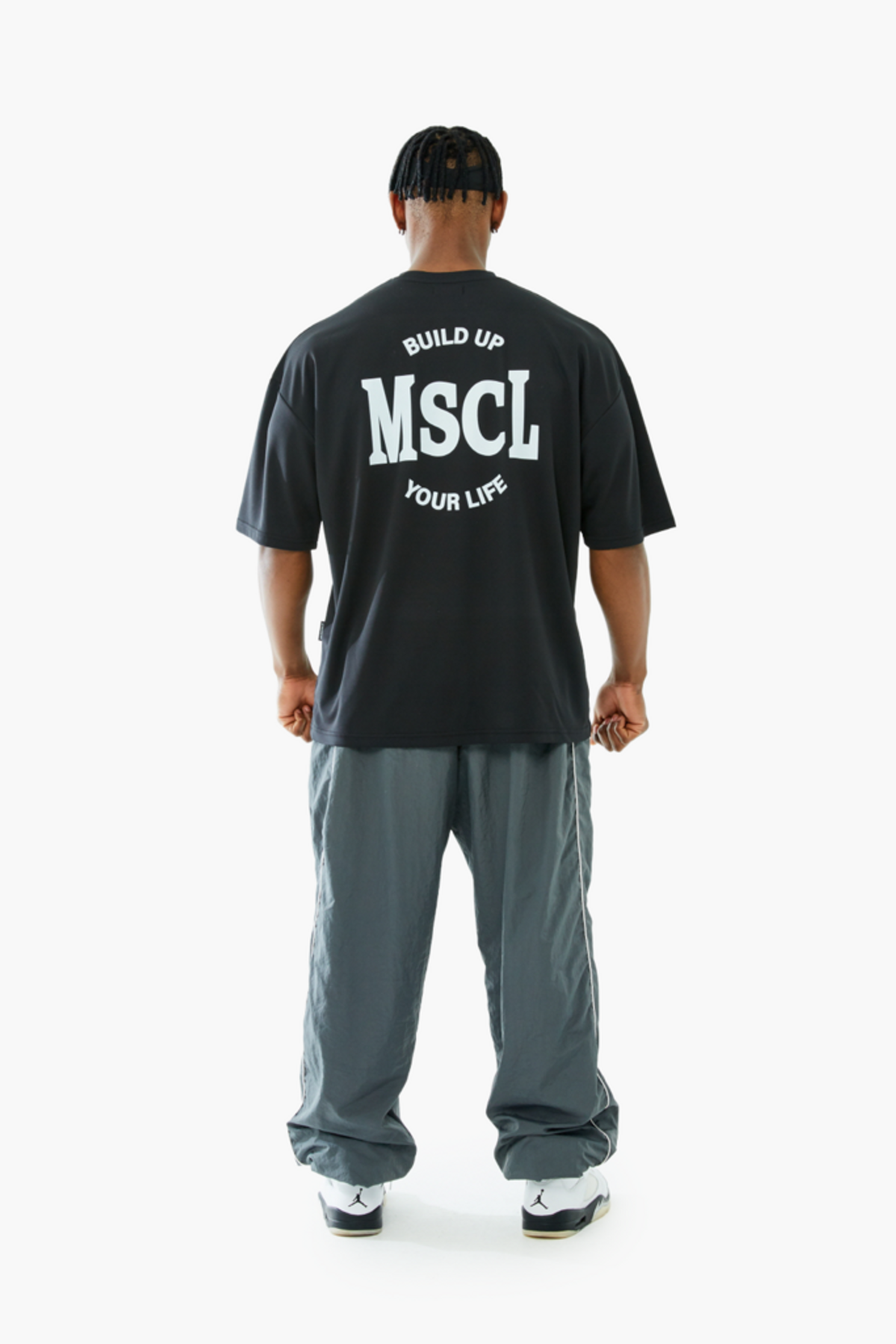 머스콜로(MUSCOLO) [MSCL 서클 로고] 에어쿨링 기능성 오버핏 반팔 티셔츠 블랙 화이트