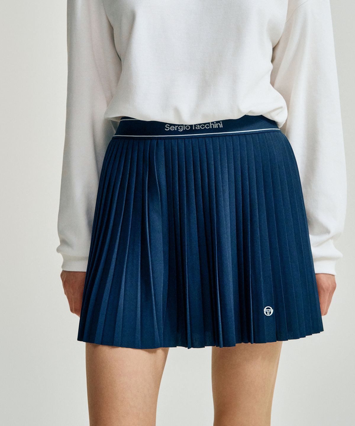 세르지오 타키니(SERGIO TACCHINI) W 타키니 플라잉 잔플리츠 스커트 (Navy)