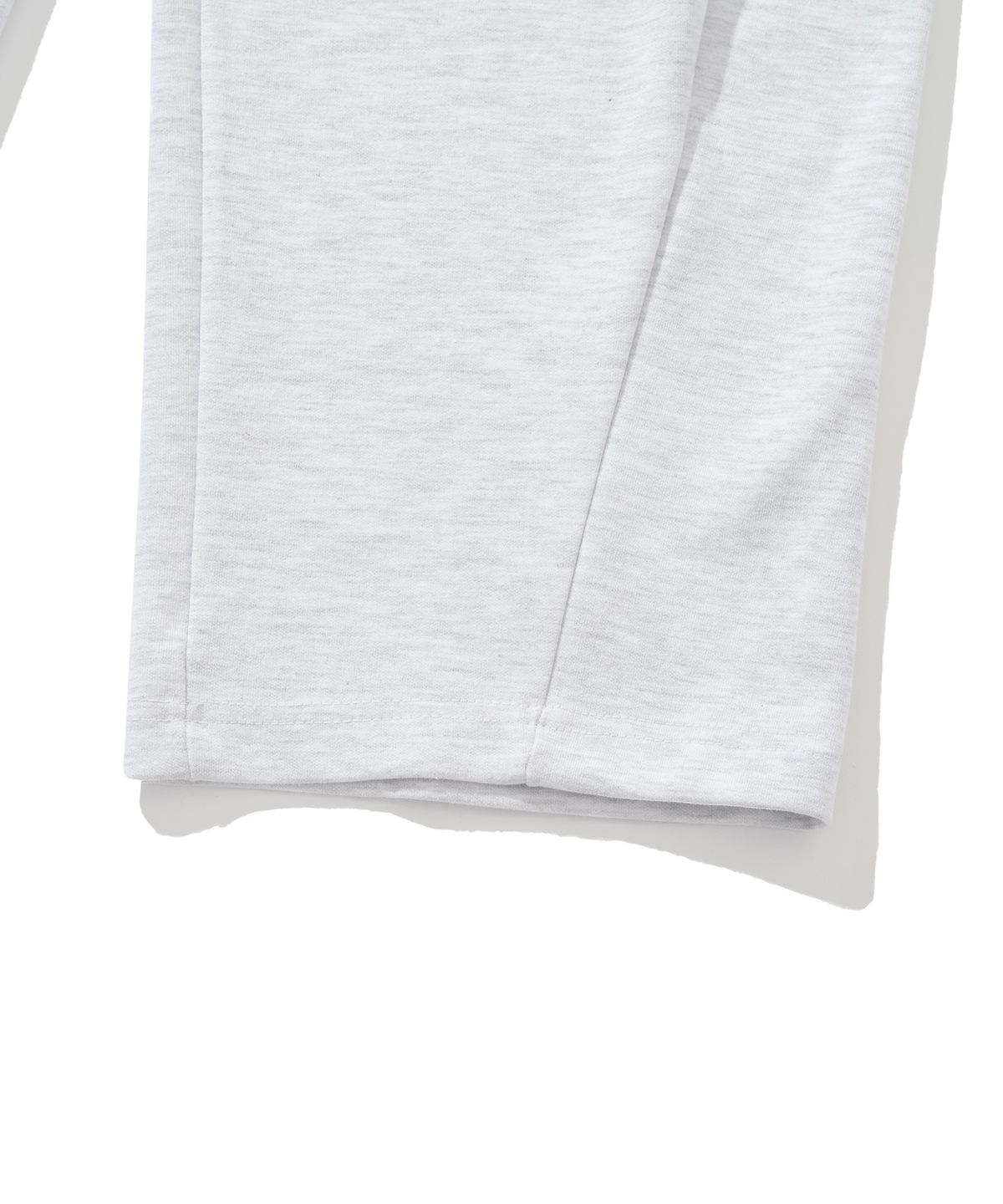 니티드(KNITTED) 커브드 트레이닝 팬츠 MELANGE WHITE