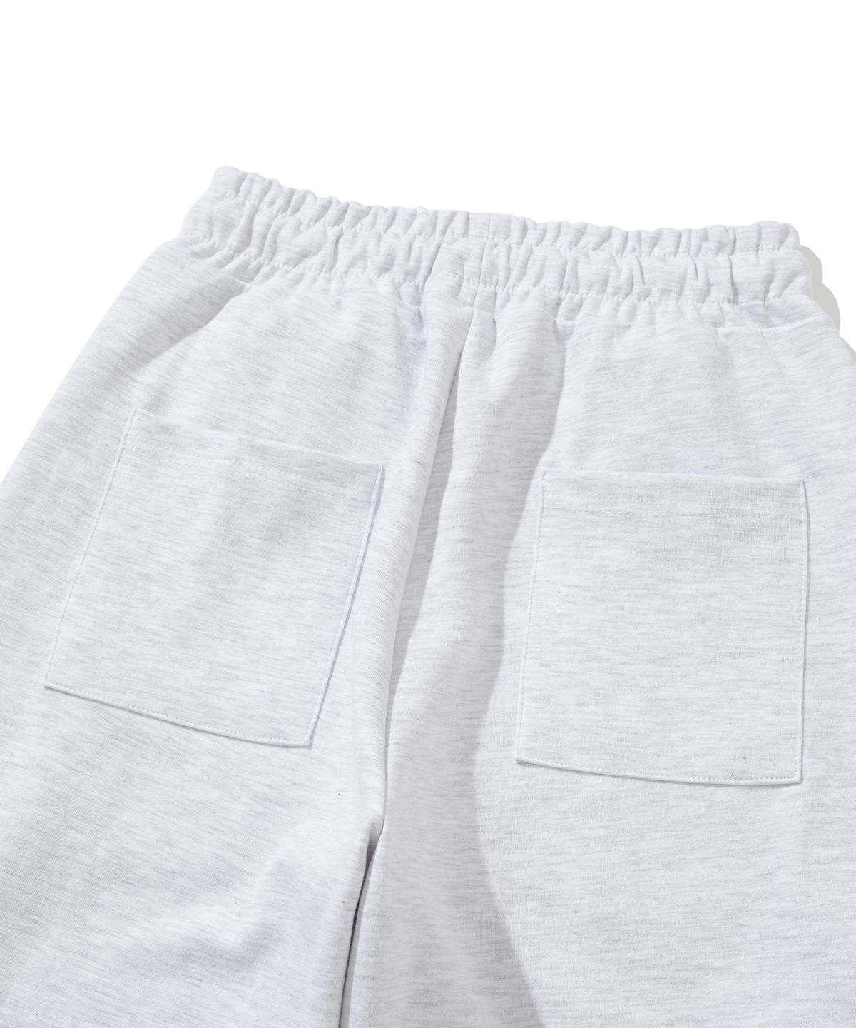 니티드(KNITTED) 커브드 트레이닝 팬츠 MELANGE WHITE