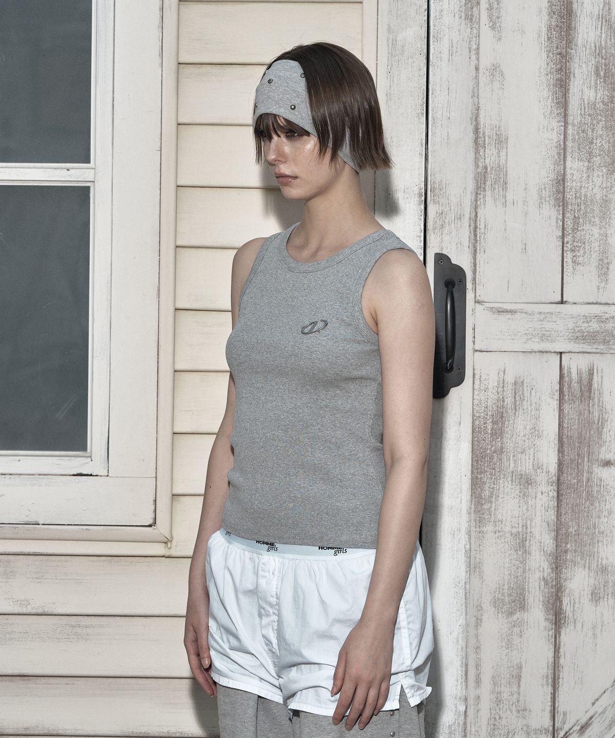 일리오(ILLIO) Gray Symbol ribbed sleeveless top