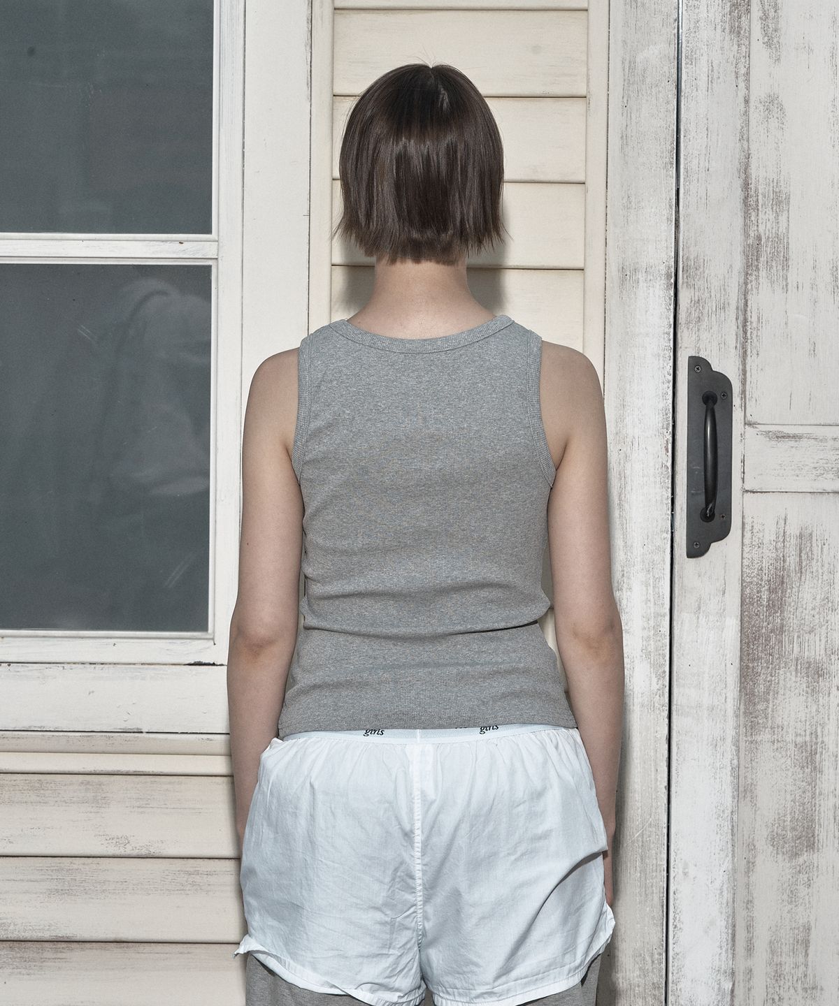 일리오(ILLIO) Gray Symbol ribbed sleeveless top