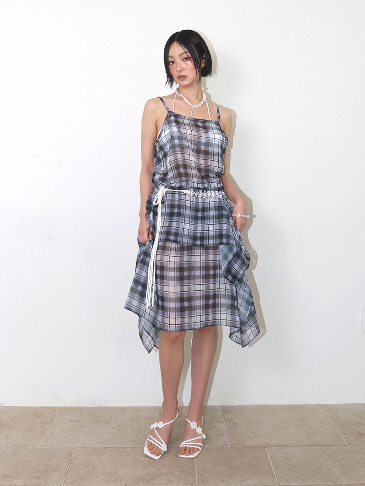 민더리(MEENDERI) SHEER ASYMMETRIC CHECK SKIRT - BLACK