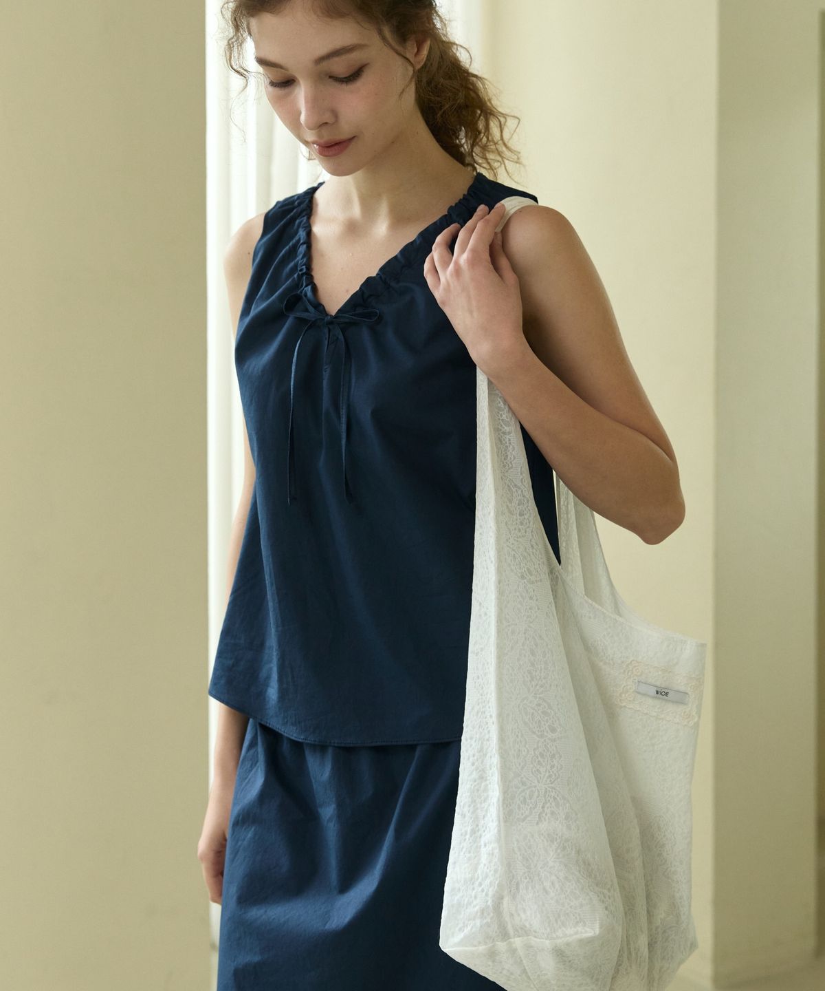 위오이(WIOE) Cotton Ribbon Midi Skirt_Navy