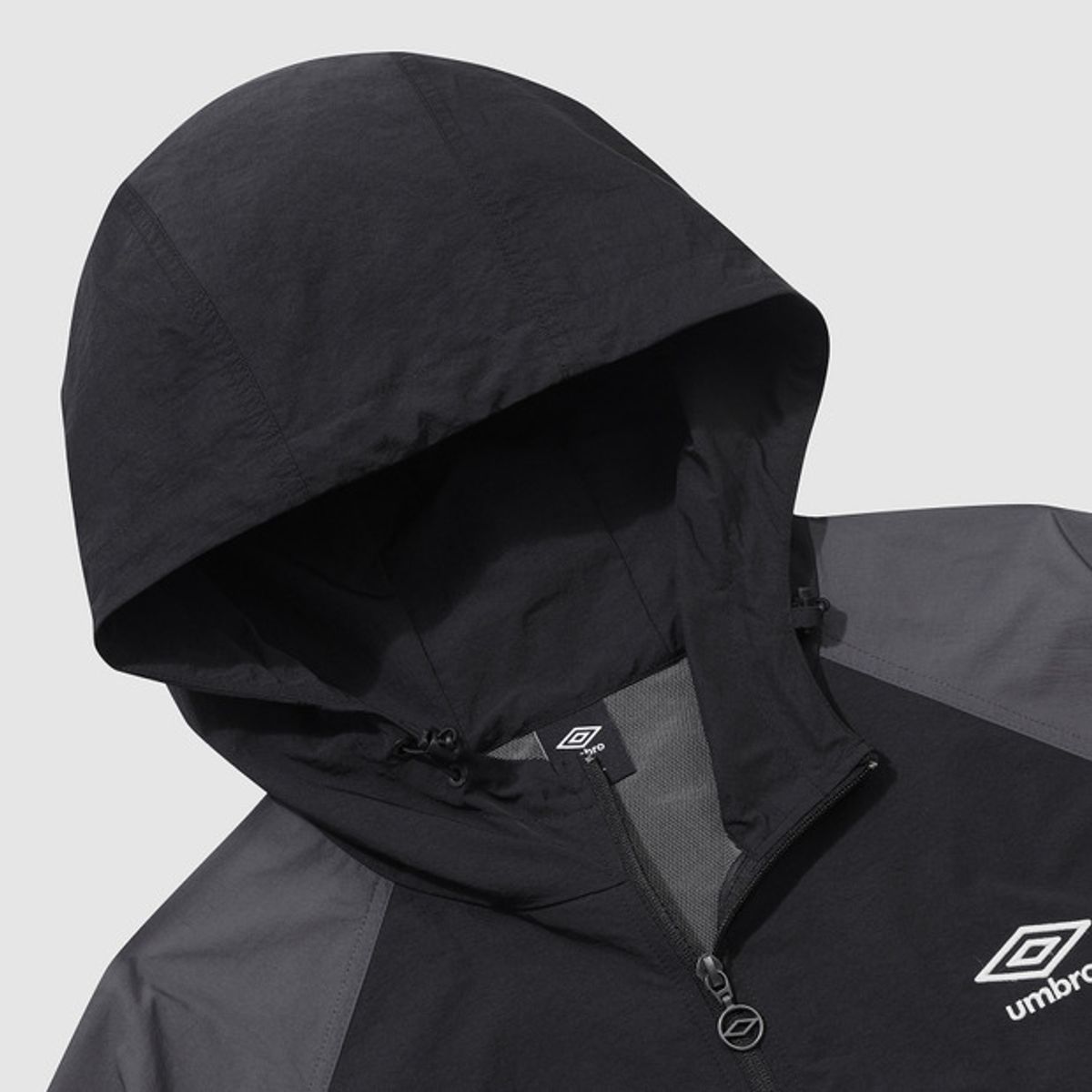 엄브로(UMBRO) 썬샤워 반팔 후드 자켓 블랙(UQ321CJK71)