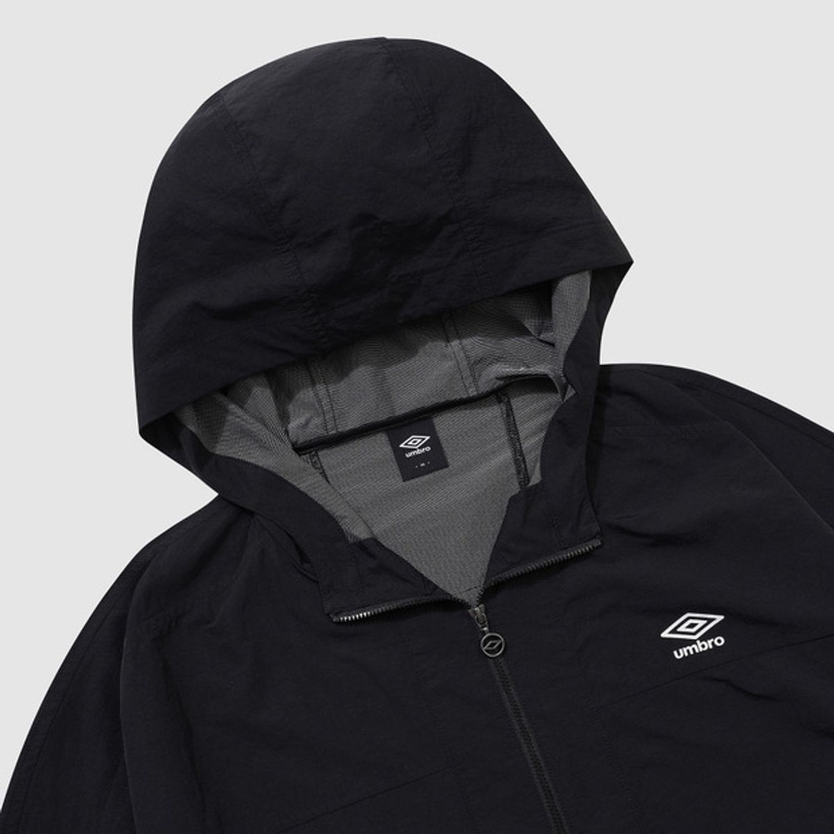 엄브로(UMBRO) 썬샤워 솔리드 우먼스 후드 아노락 블랙(UQ322CWT71)