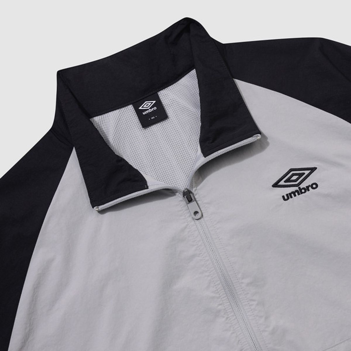 엄브로(UMBRO) 썬샤워 스탠넥 반팔 아노락 그레이(UQ321CWT71)