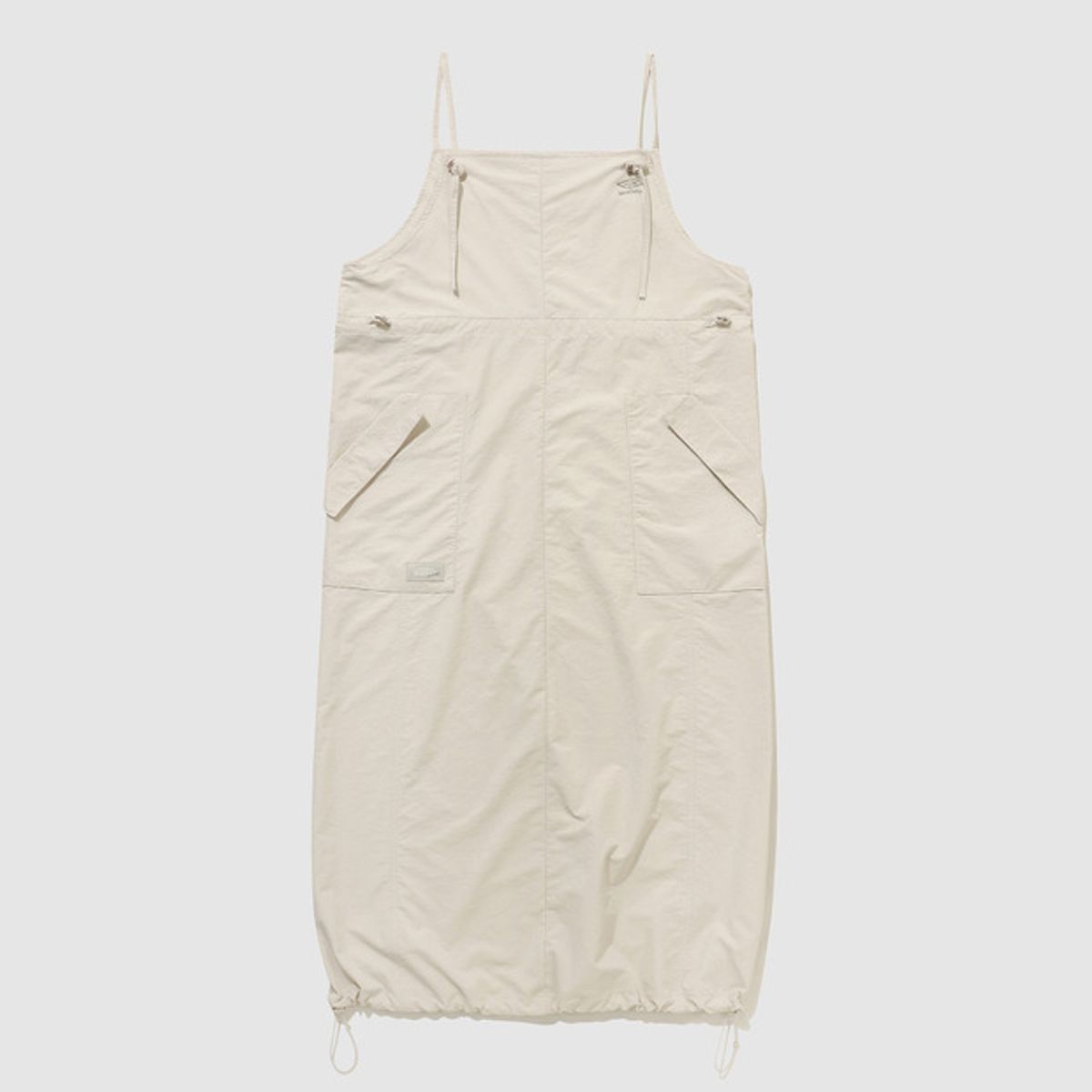 엄브로(UMBRO) 썬샤워 슬리브리스 우븐 원피스 베이지(UQ322COP71)