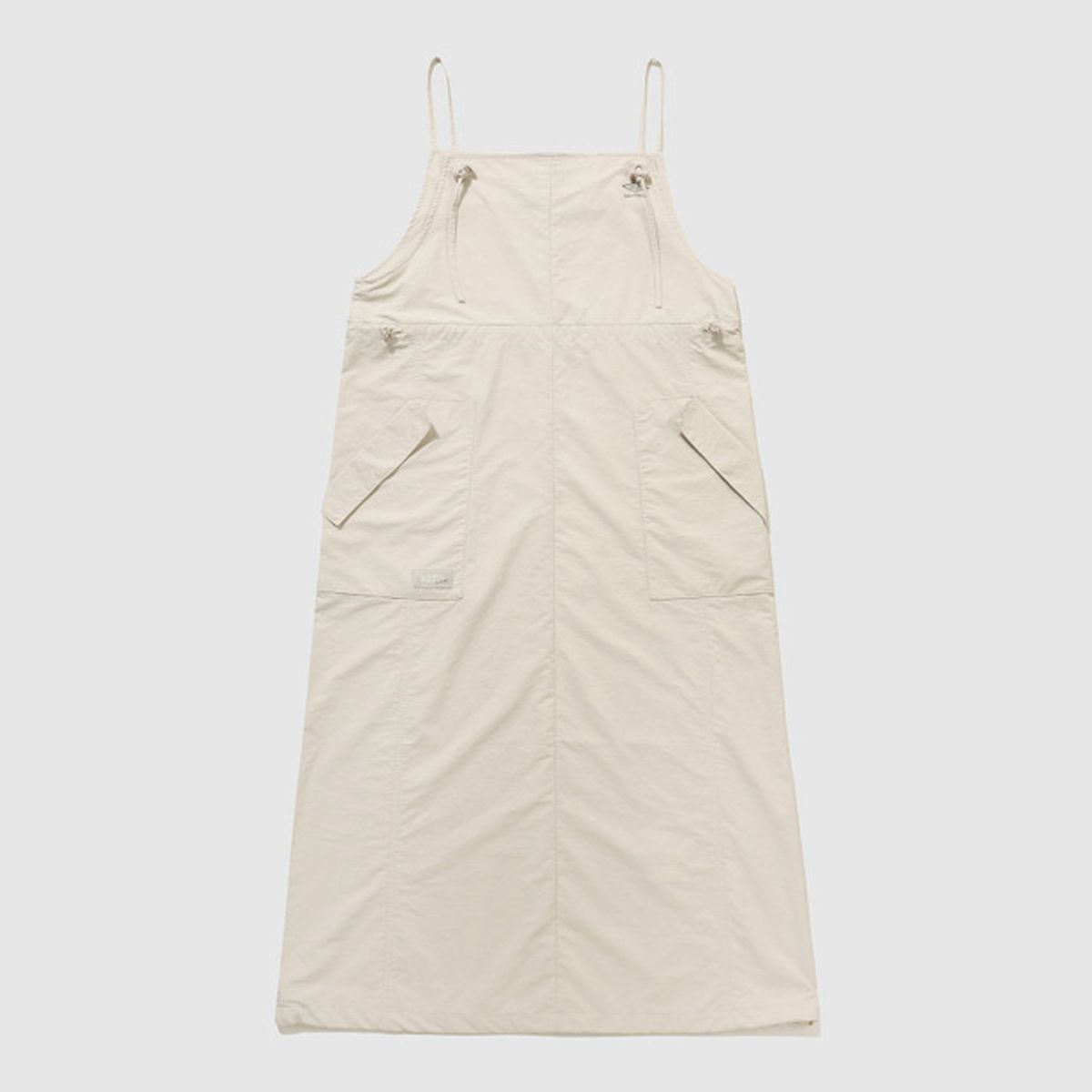 엄브로(UMBRO) 썬샤워 슬리브리스 우븐 원피스 베이지(UQ322COP71)