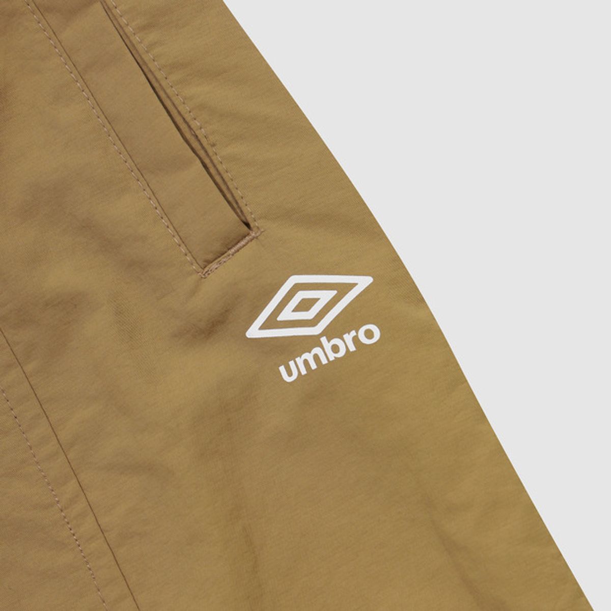 엄브로(UMBRO) 썬샤워 우먼스 미디 스커트 브라운(UQ322CSK71)