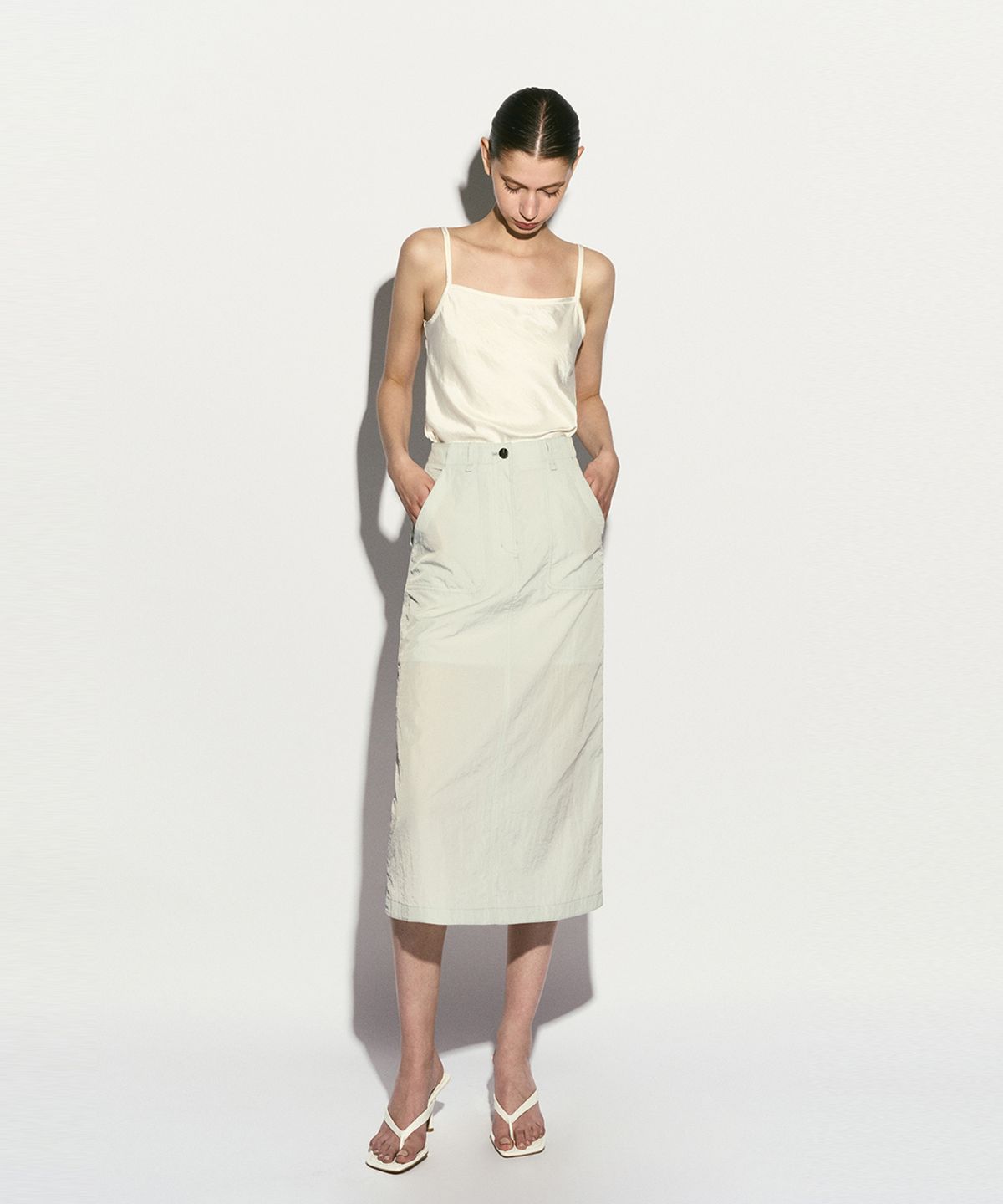 리이(RE RHEE) MIDI NYLON SKIRT
