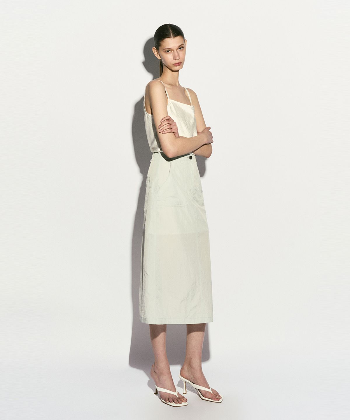 리이(RE RHEE) MIDI NYLON SKIRT