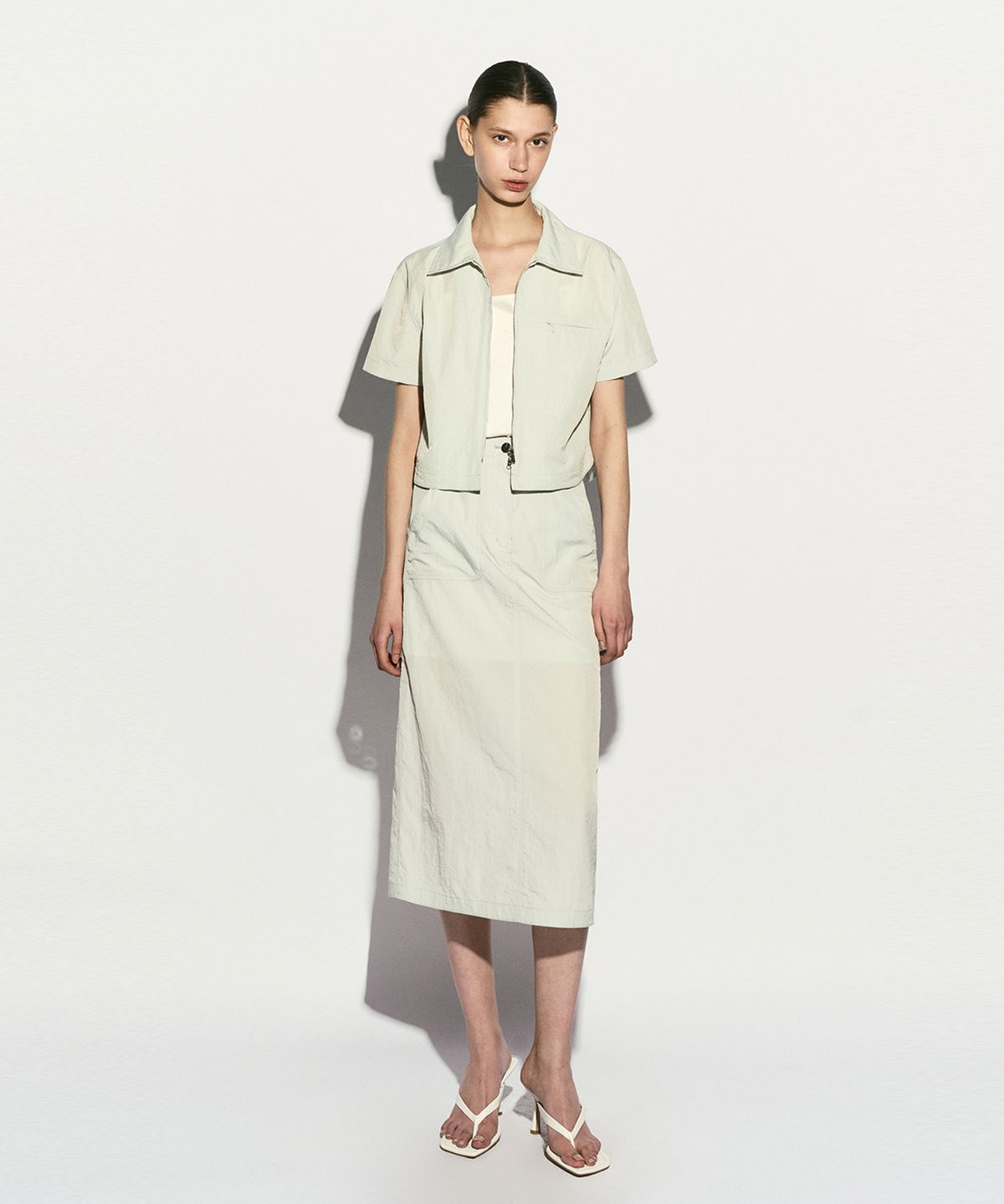 리이(RE RHEE) MIDI NYLON SKIRT