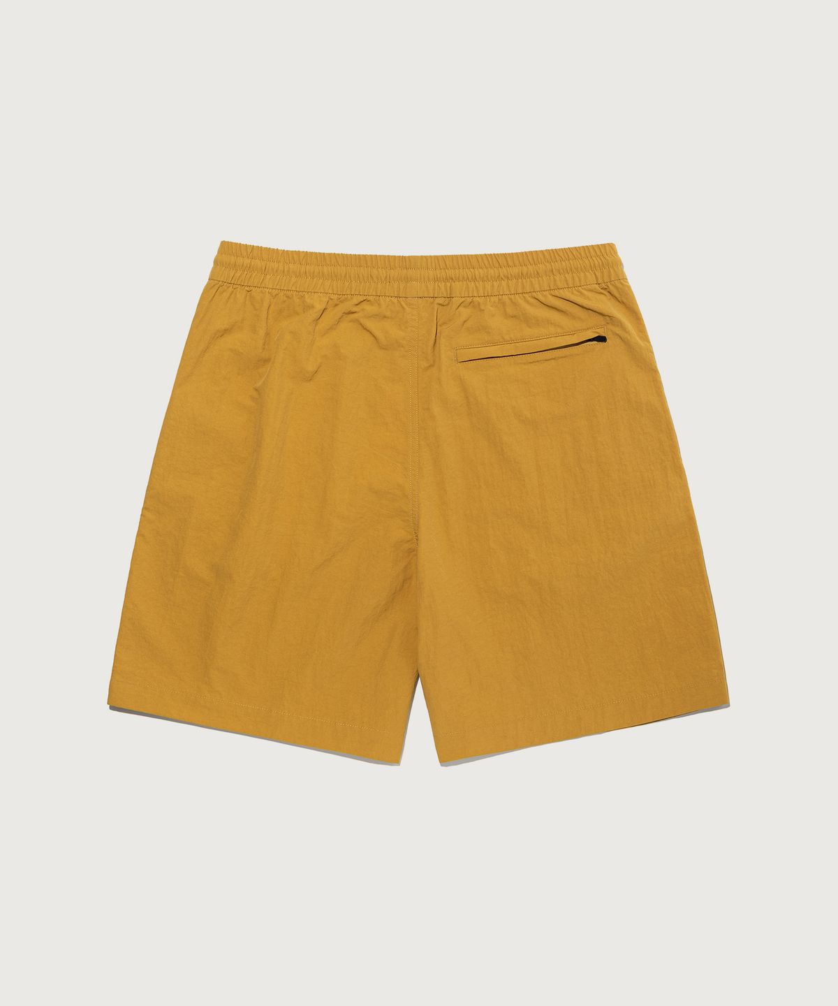 챔피온(CHAMPION) C로고 우븐 스트링 숏팬츠 Mustard