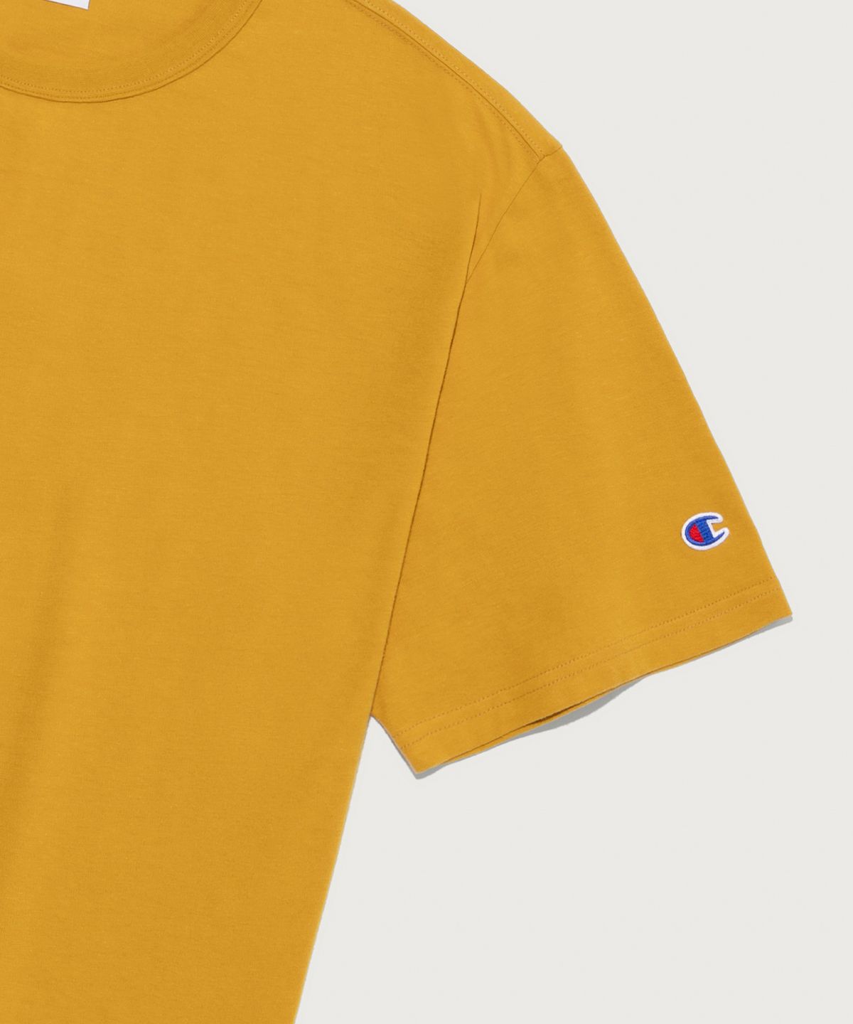 챔피온(CHAMPION) C로고 UNI 반팔 티셔츠 Mustard