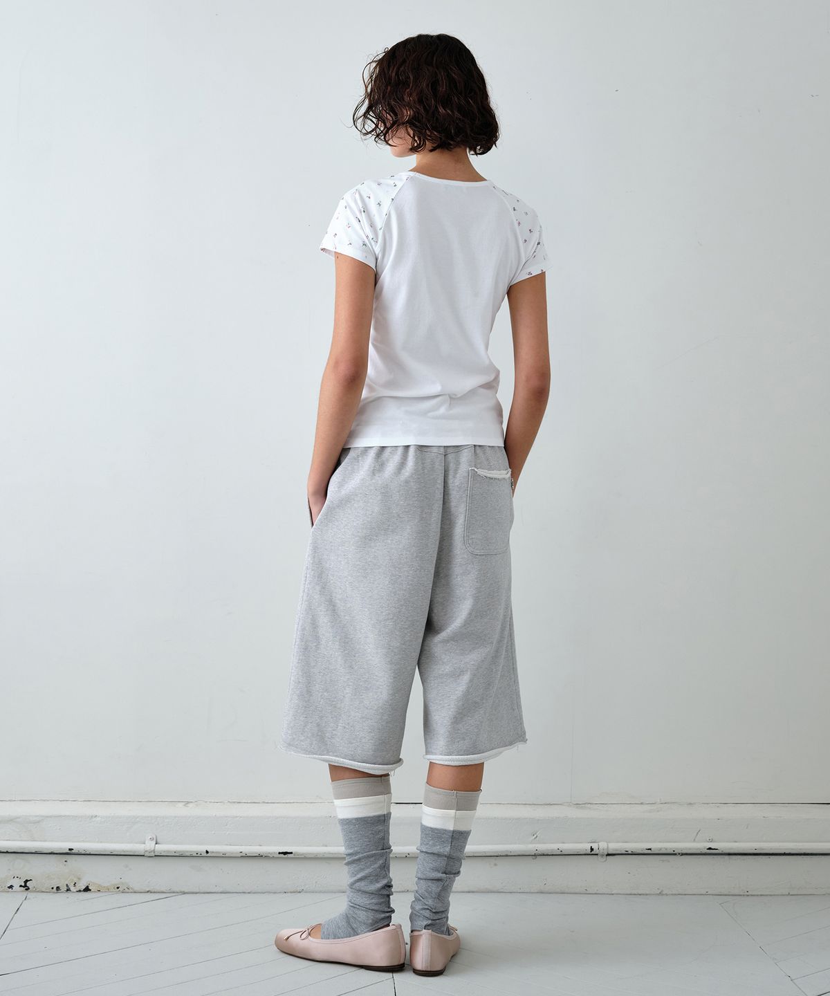 시메트릭 퍼센트(SYMMETRICPERCENT) Bermuda Sweat Pants / Melange Grey