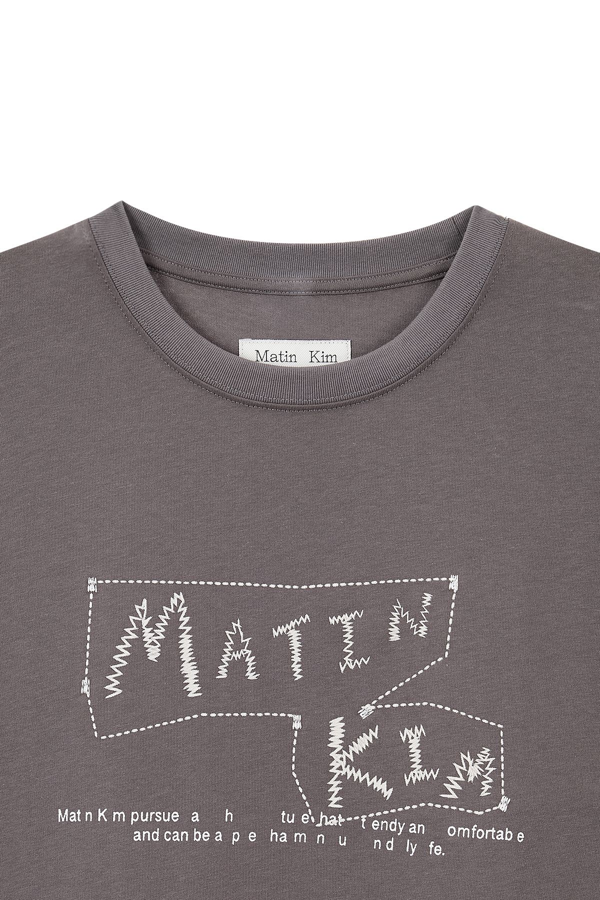 MUSINSA | MATIN KIM DOODLE LOGO GRAPHIC TOP IN CHARCOAL