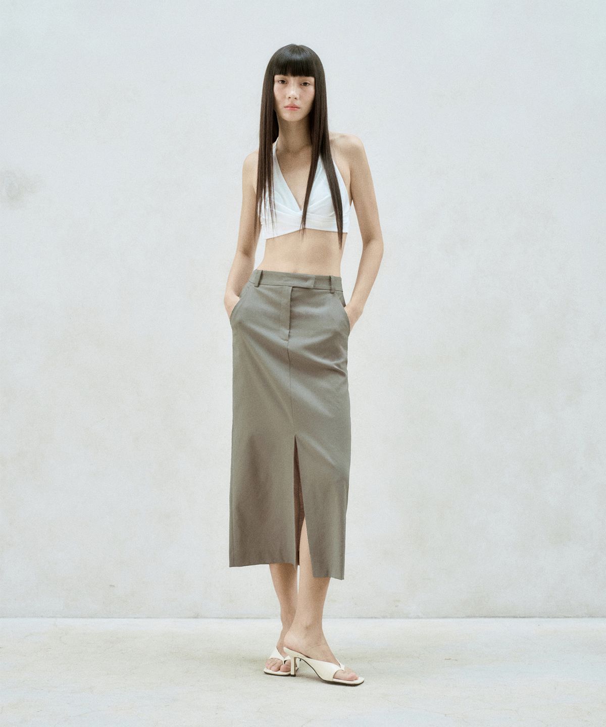 리이(RE RHEE) FRONT SLIT MIDI SKIRT
