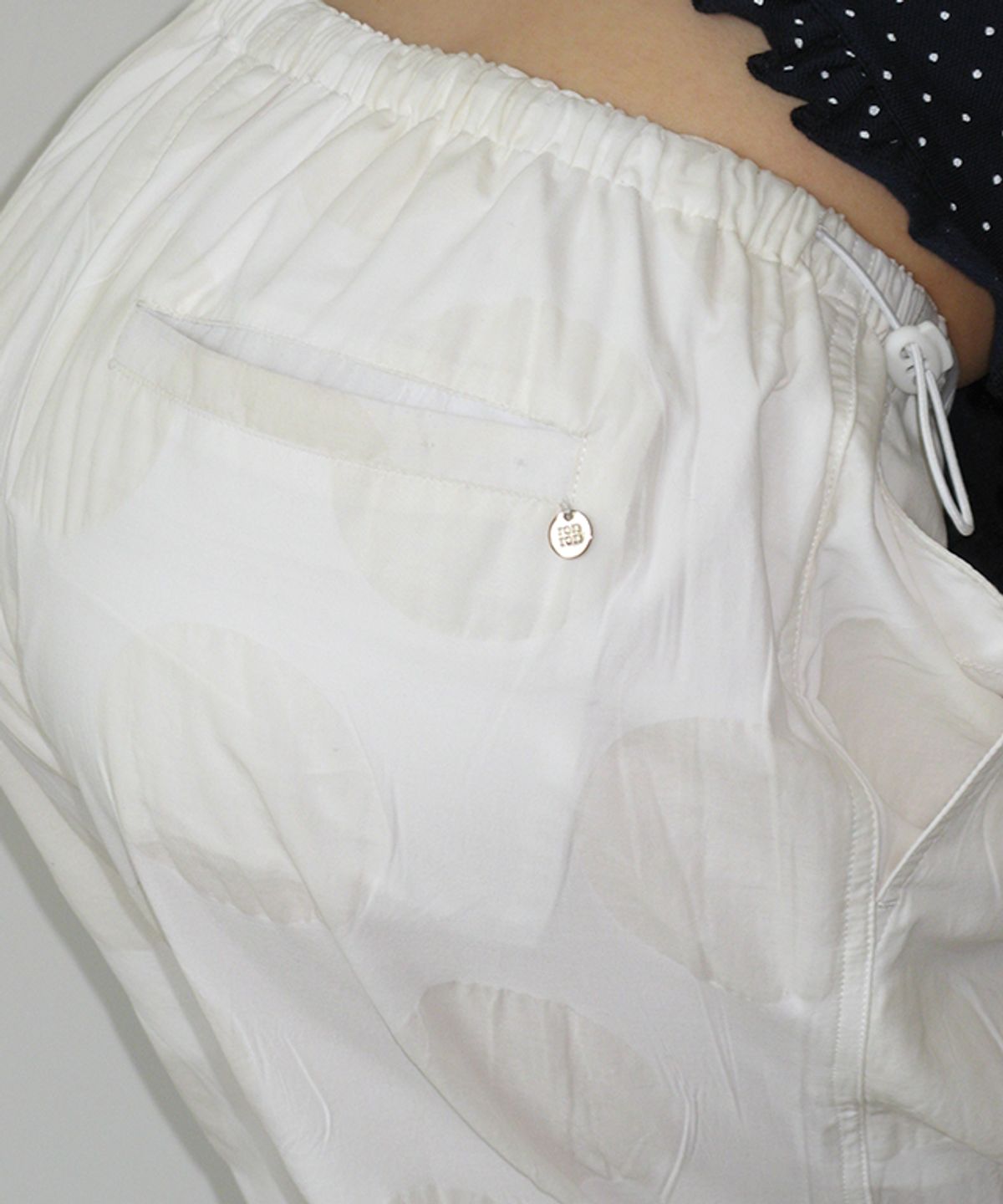 론론(RONRON) AIRY DOT SHEER STRING PANTS WHITE