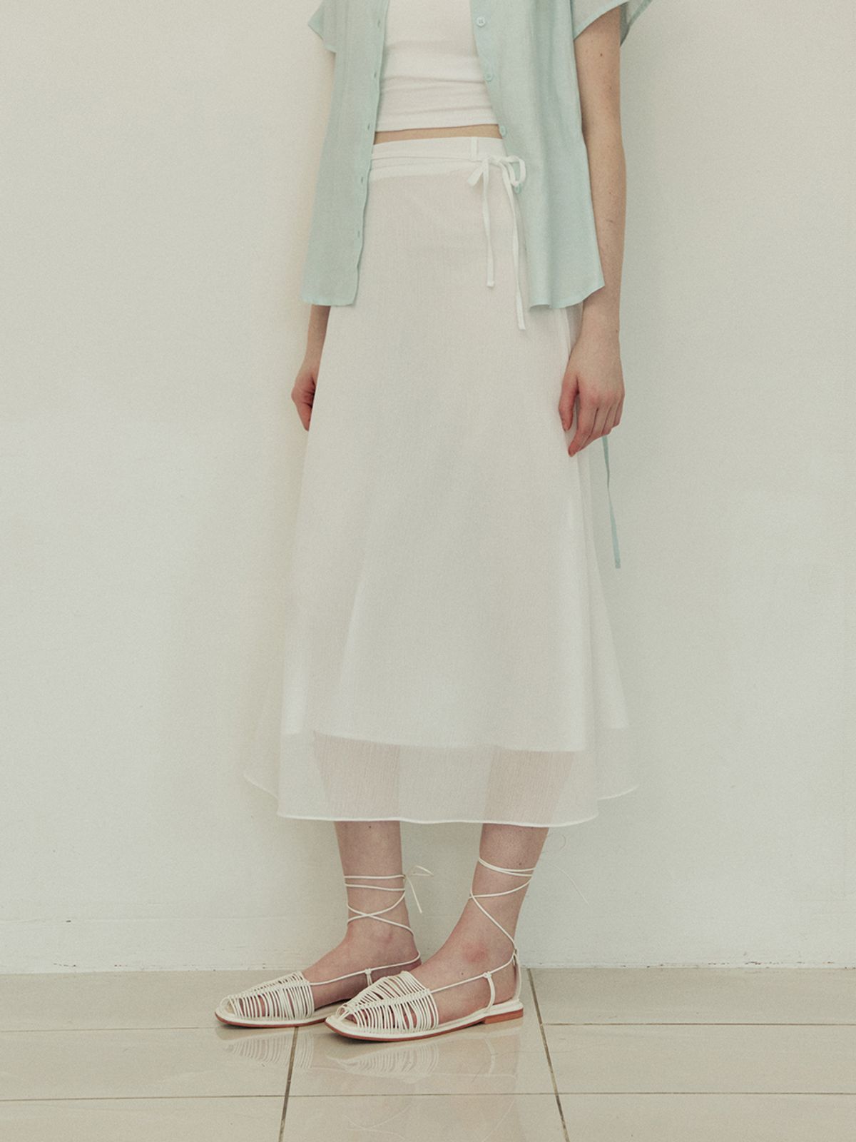 어다울(ADAUL) Double line ribbon strap long flare skirt - white