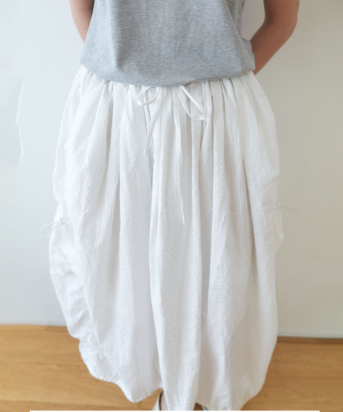 스텝어라운드(STEP AROUND) Seersucker balloon cargo skirt_WHITE
