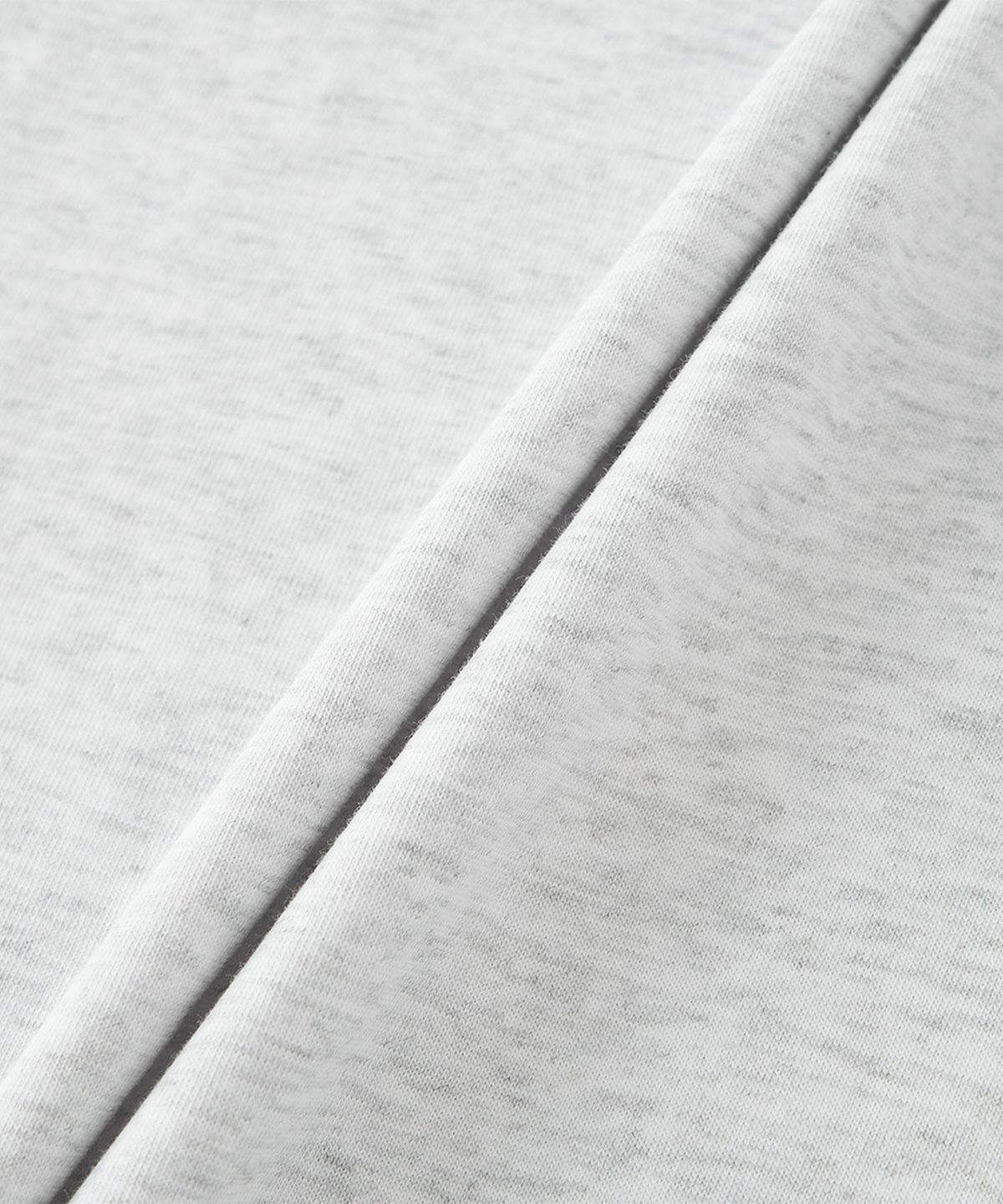 뉴발란스(NEW BALANCE) NBNEF31743 / UNI Ndurance 레터링 반팔티 (LIGHT GRAY)