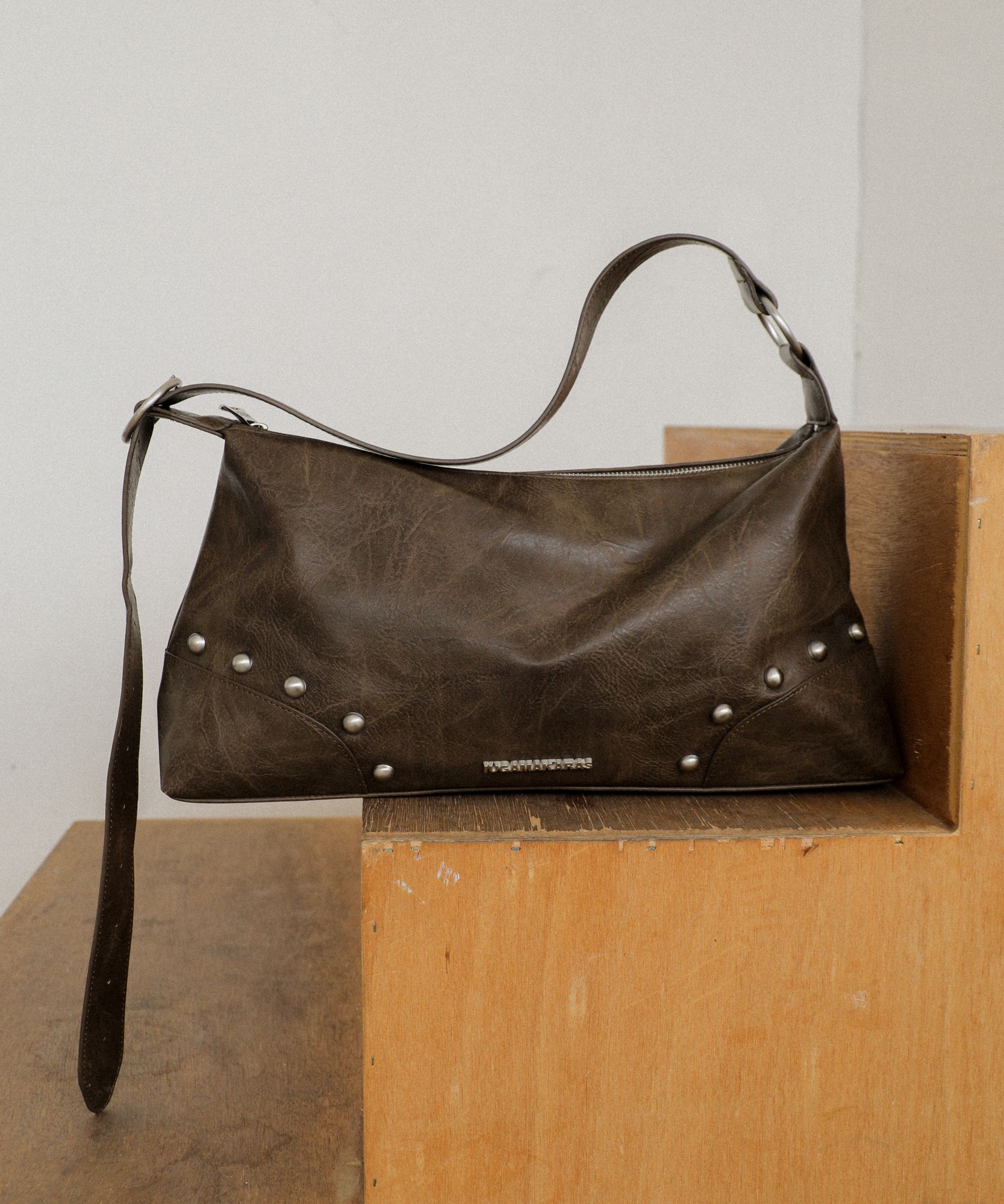 MUSINSA | IUGAMAKARAS Studded Hobo Bag (Brown)