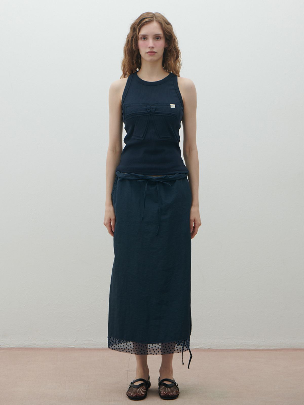 더블힙스(HHIPS) 도트 배색 나일론 스커트(navy)