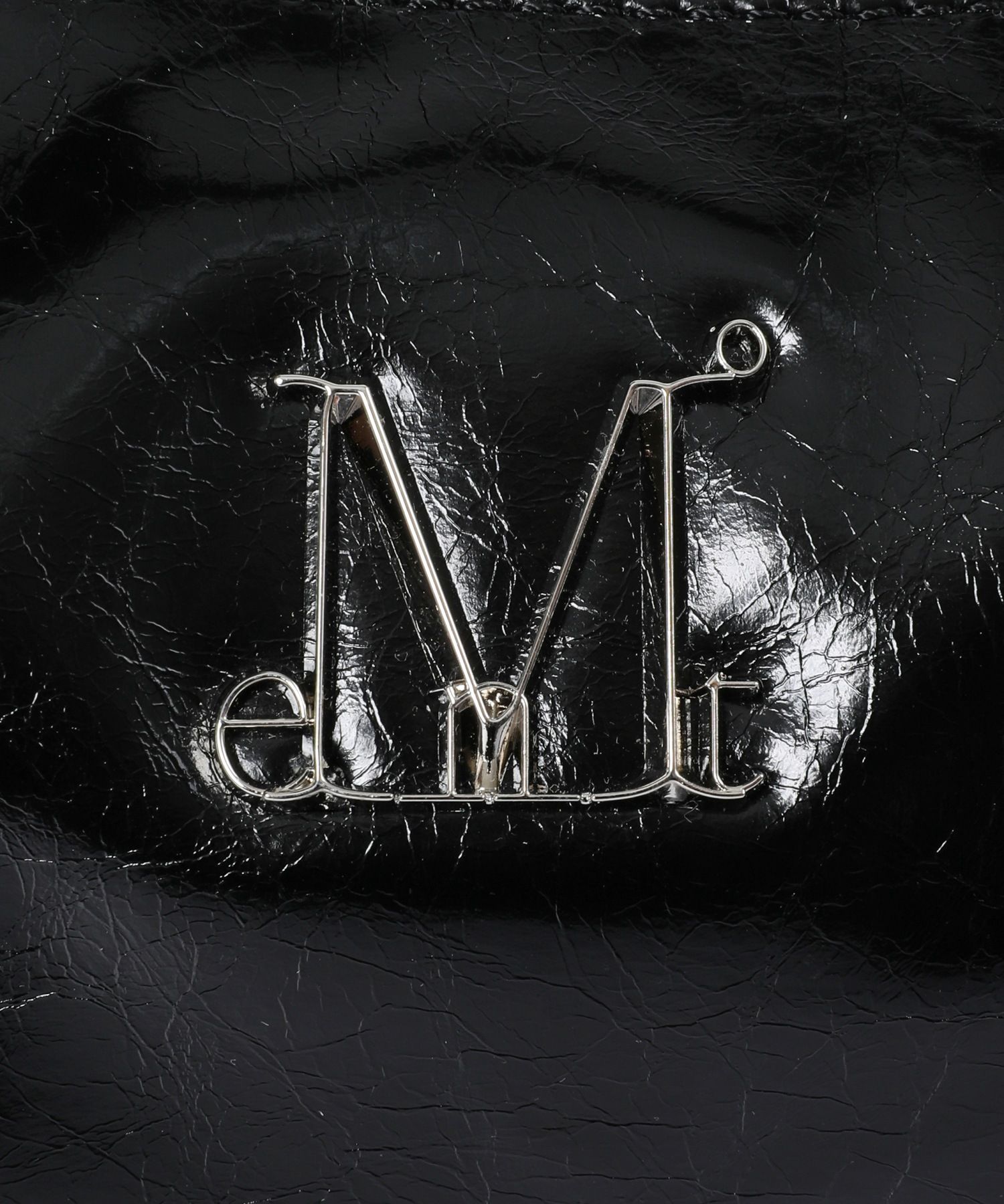 MUSINSA | MUCENT Barb Metal Logo 2 Way Eyelet Crossbody Bag