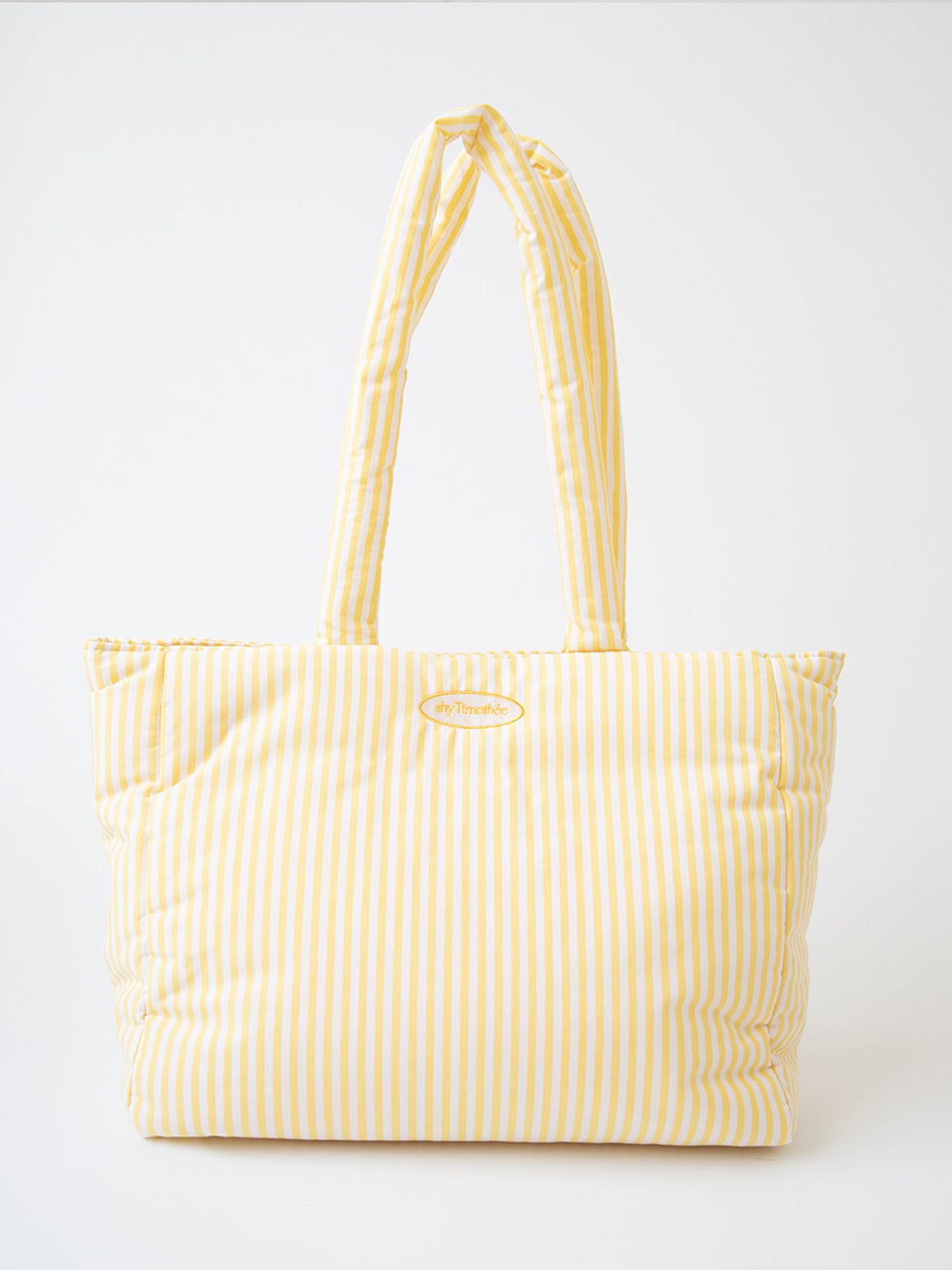 샤이티모시(SHYTIMOTHEE) Large stripe padded bag _yellow